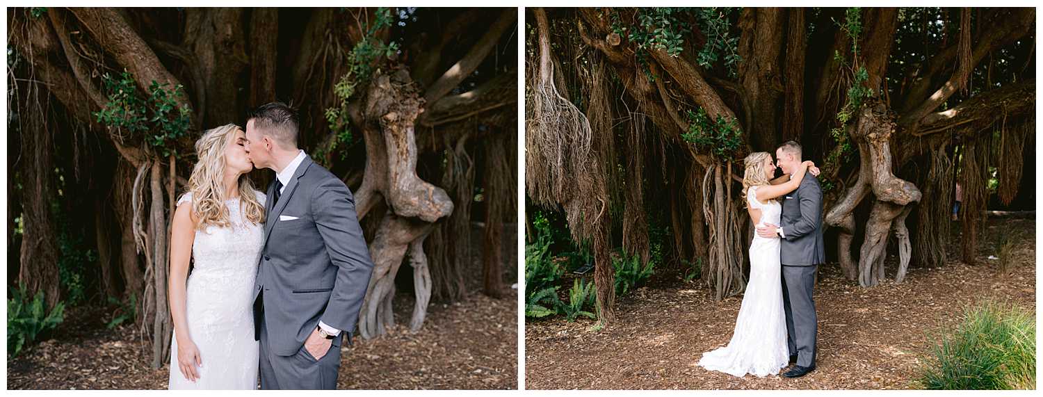 Kelsey and Mitchell in a wooded area of the botanical garden