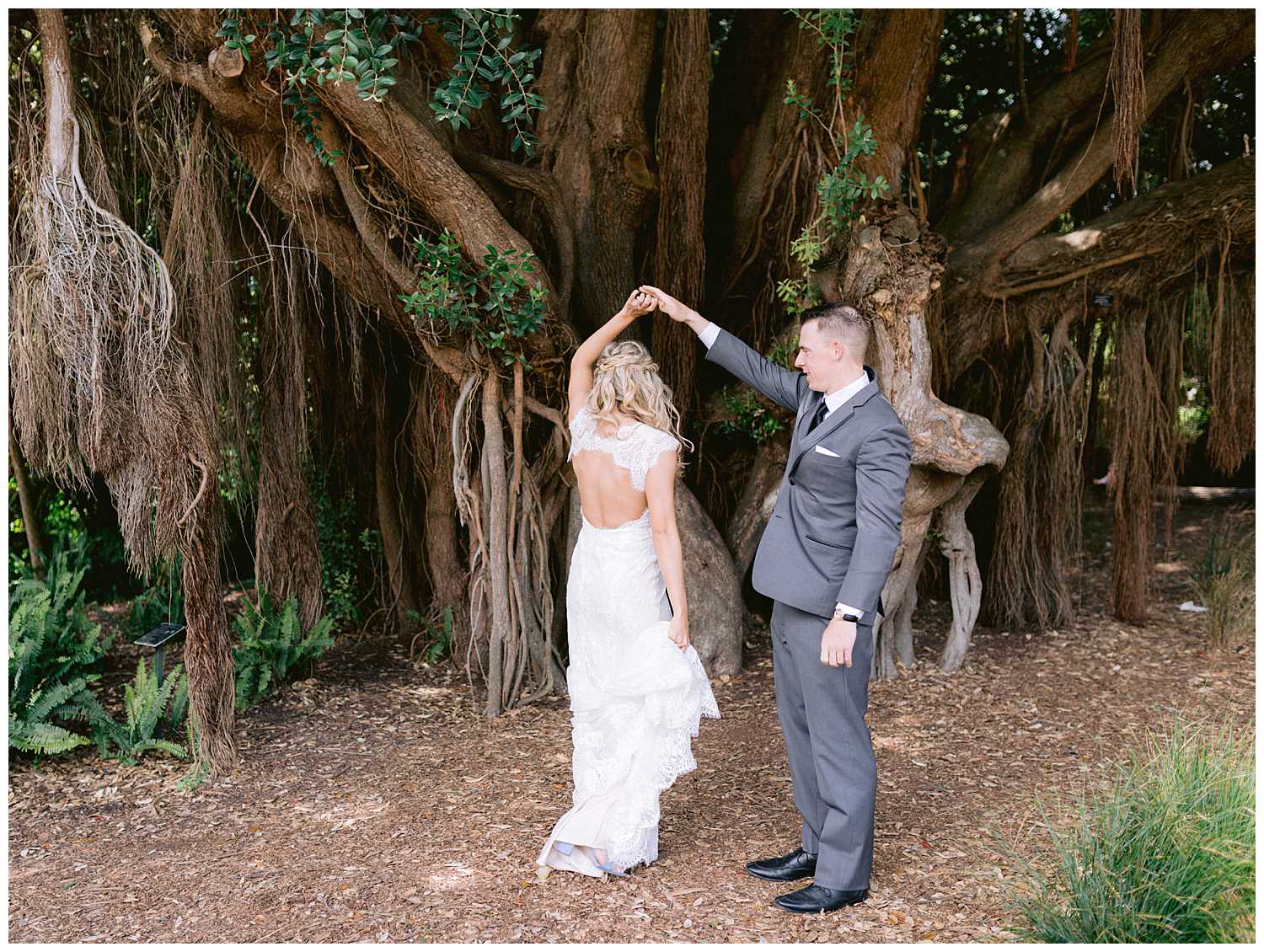 Kelsey getting twirled at the botanical garden