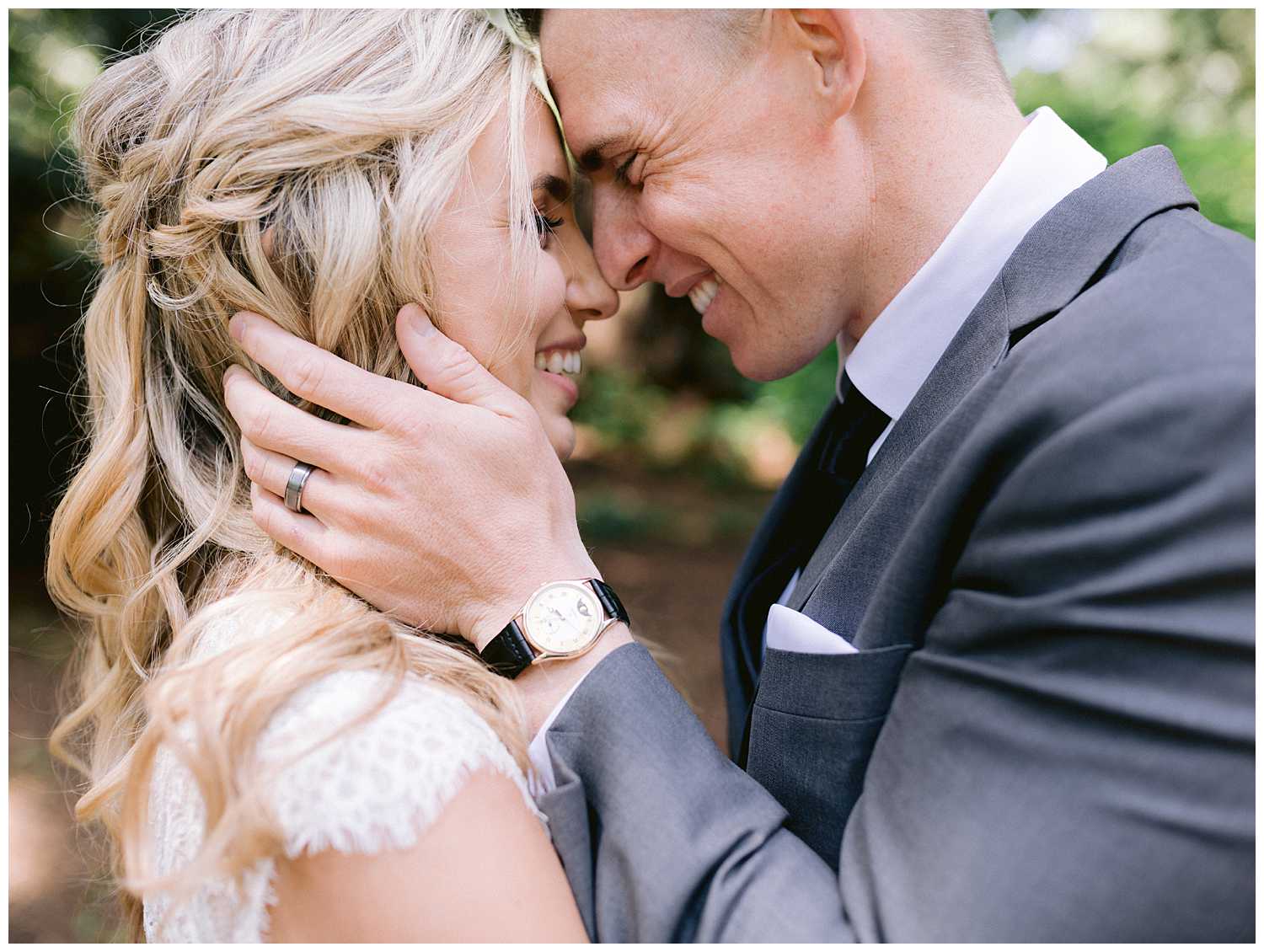 Close up of Kelsey and Mitchell nose nuzzling