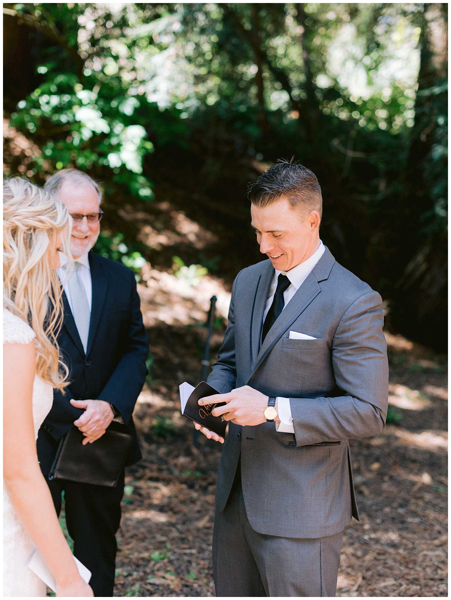 Mitchell reading his vows from his 'vows' notebook