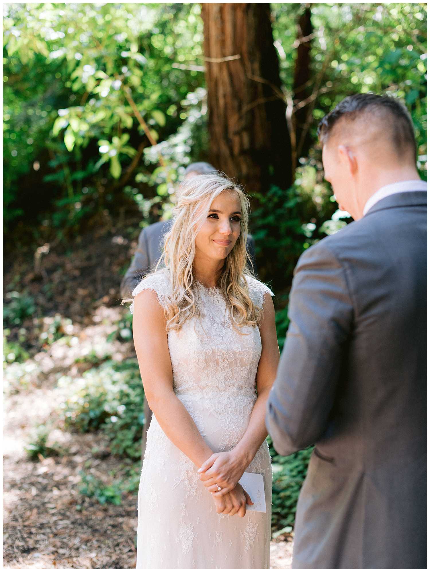 Kelsey listens to Mitchell's vows
