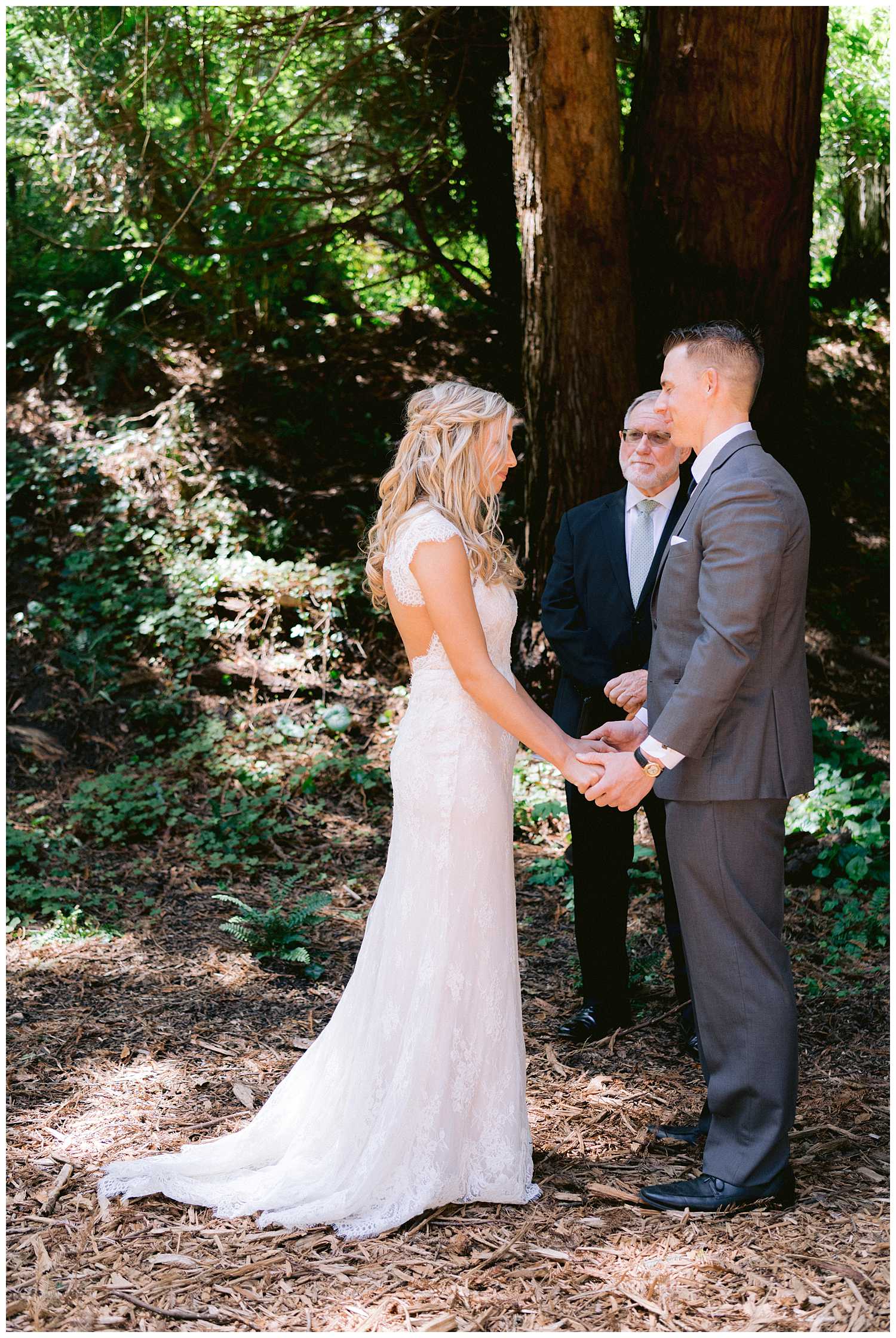 Kelsey and Mitchel holding hands during the ceremony