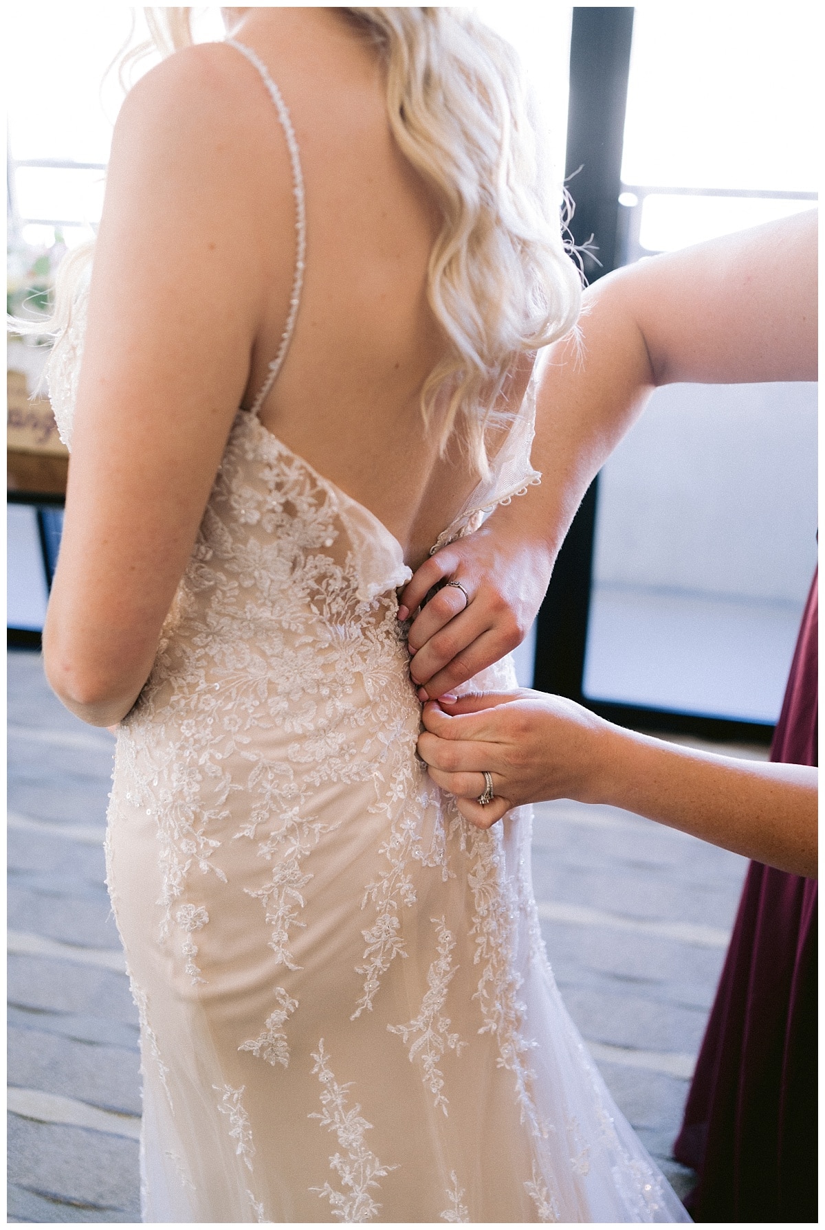 Alyssa getting her wedding dress on