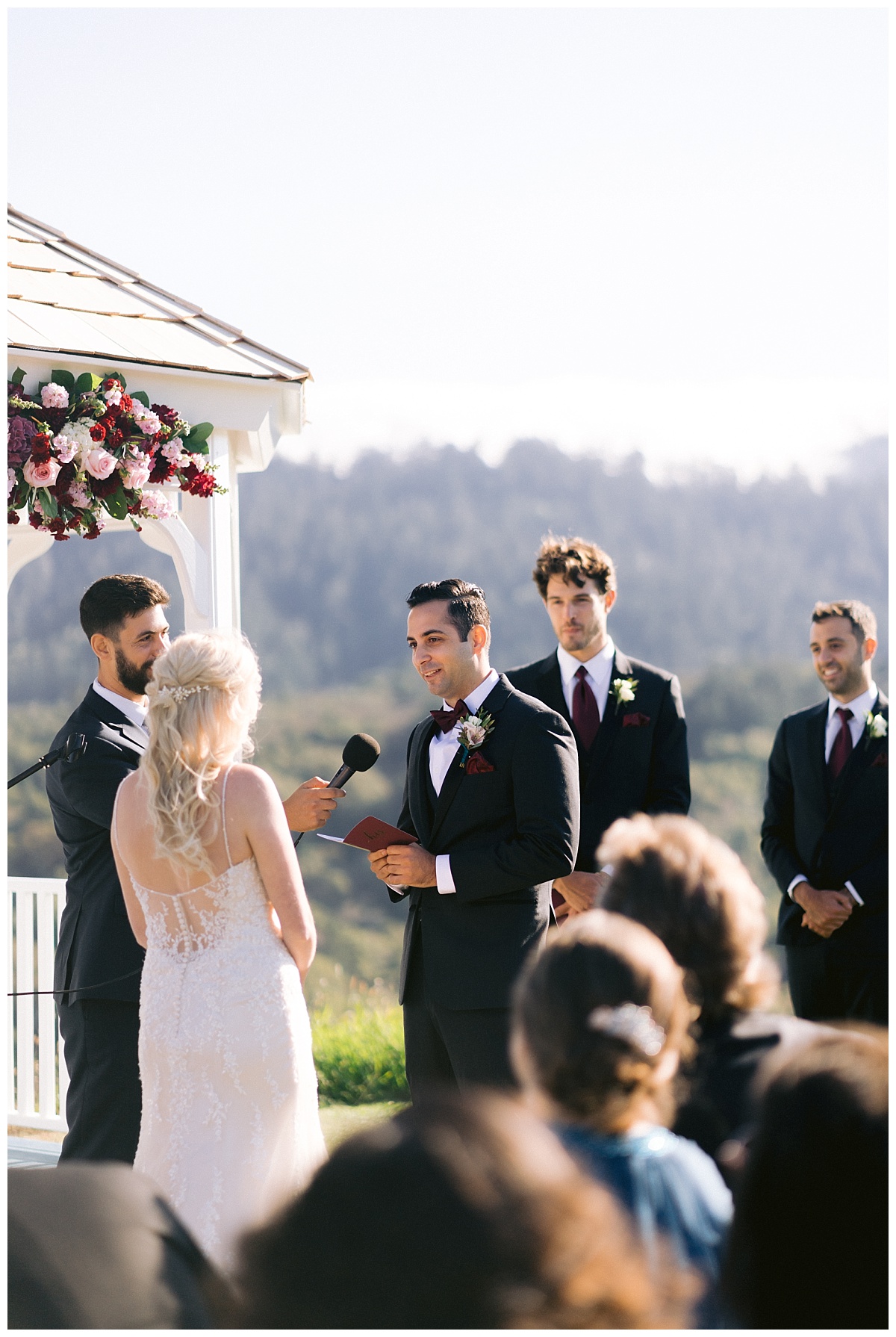 Niv reading his vows to Alyssa