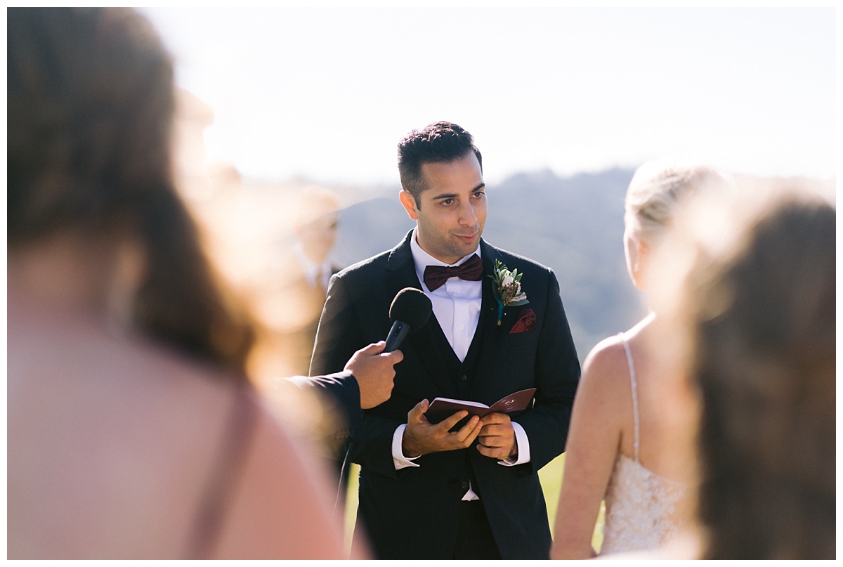 Niv reading his vows to Alyssa
