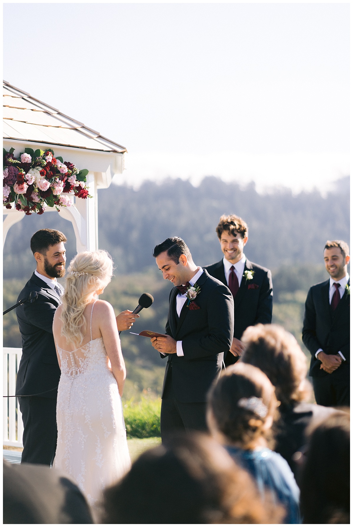 Niv reading his vows to Alyssa