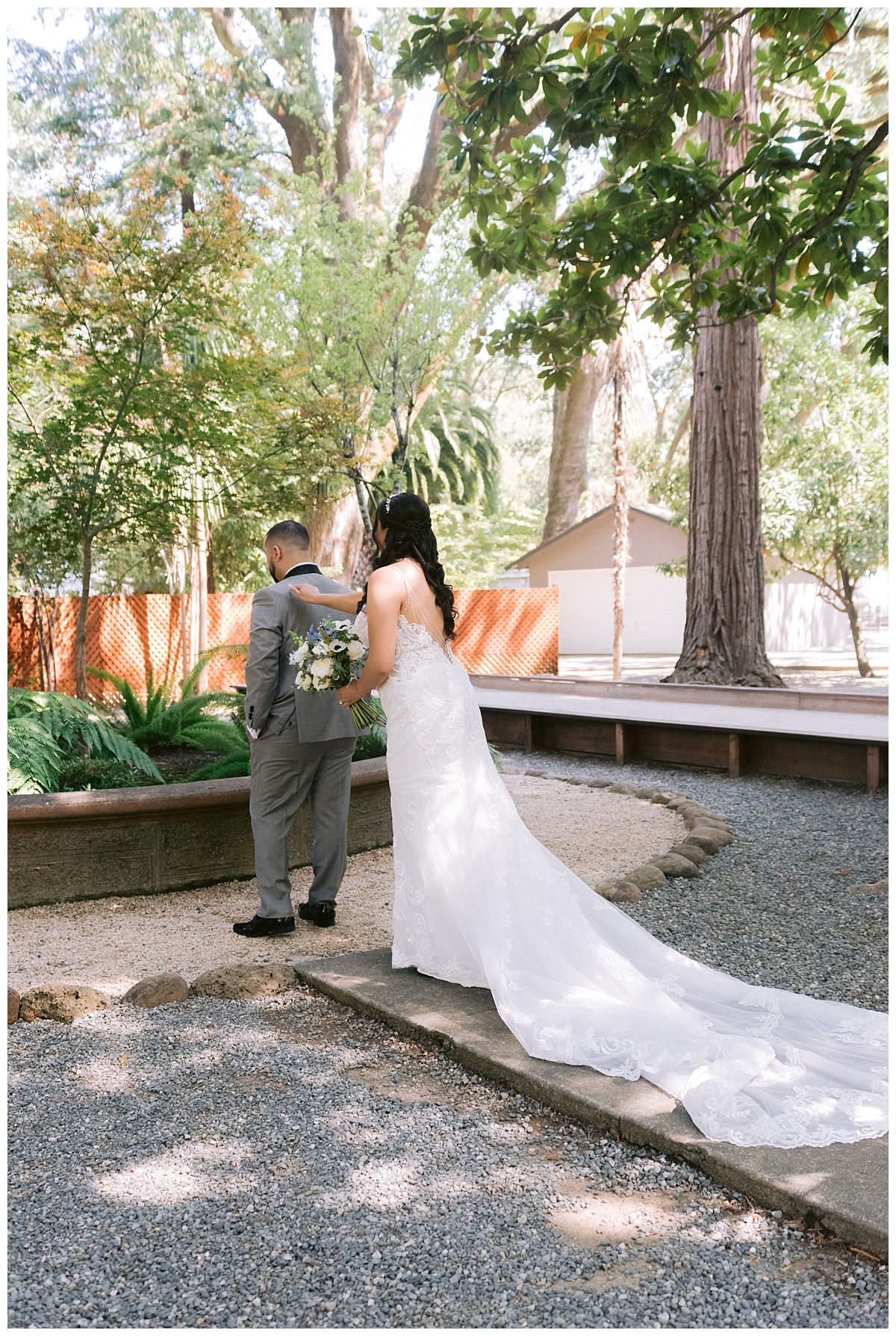 bride tapping groom on shoulder for their first look before the Deer Park Villa Wedding