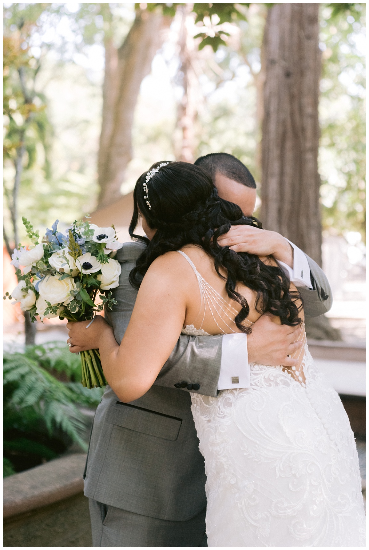 bride and groom hug during their first look before their Deer Park Villa Wedding