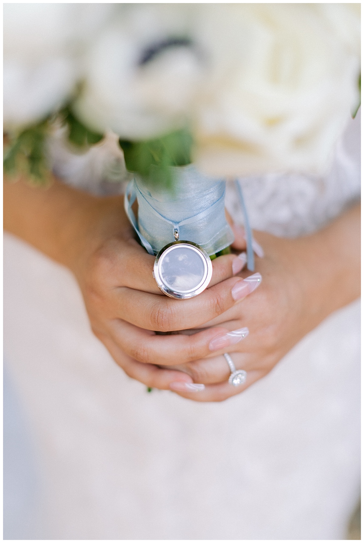Custom family photo charm on Liliana's bridal bouquet