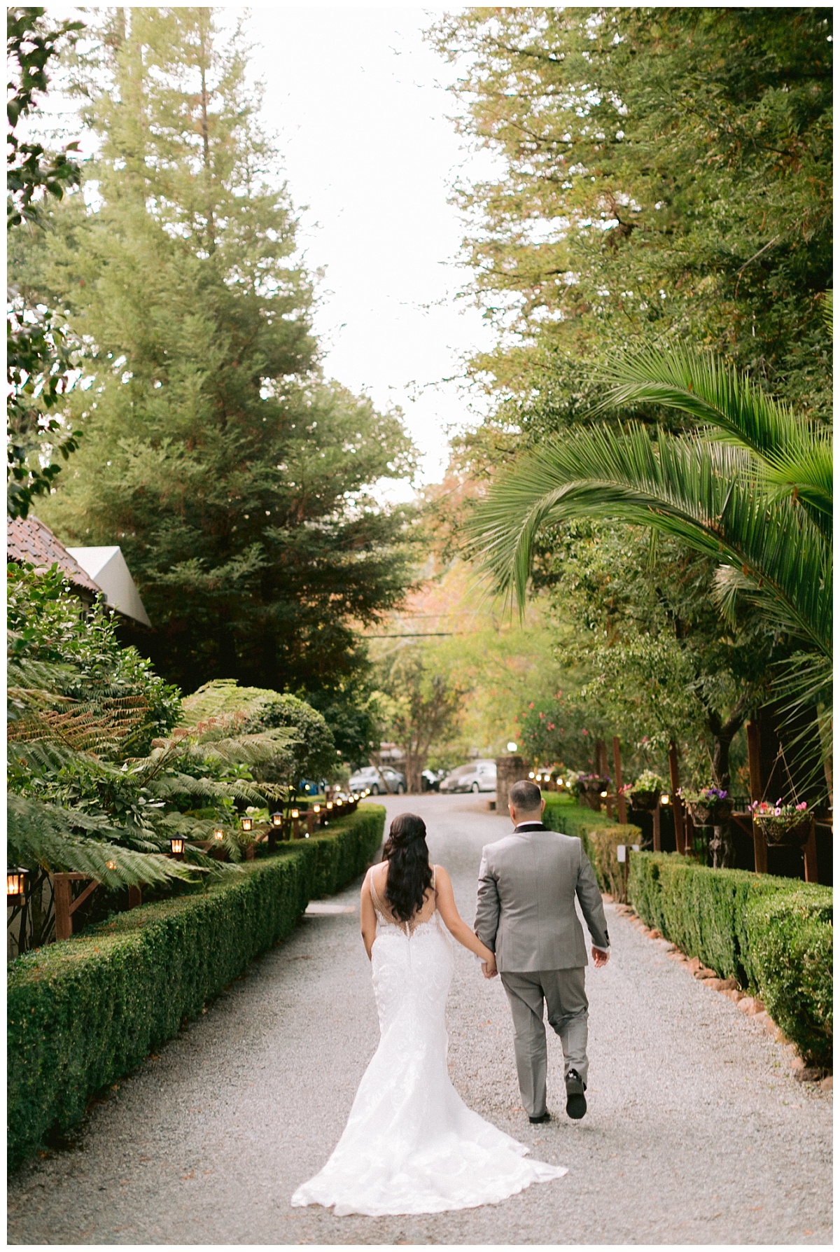 bride and groom walking hand in hand