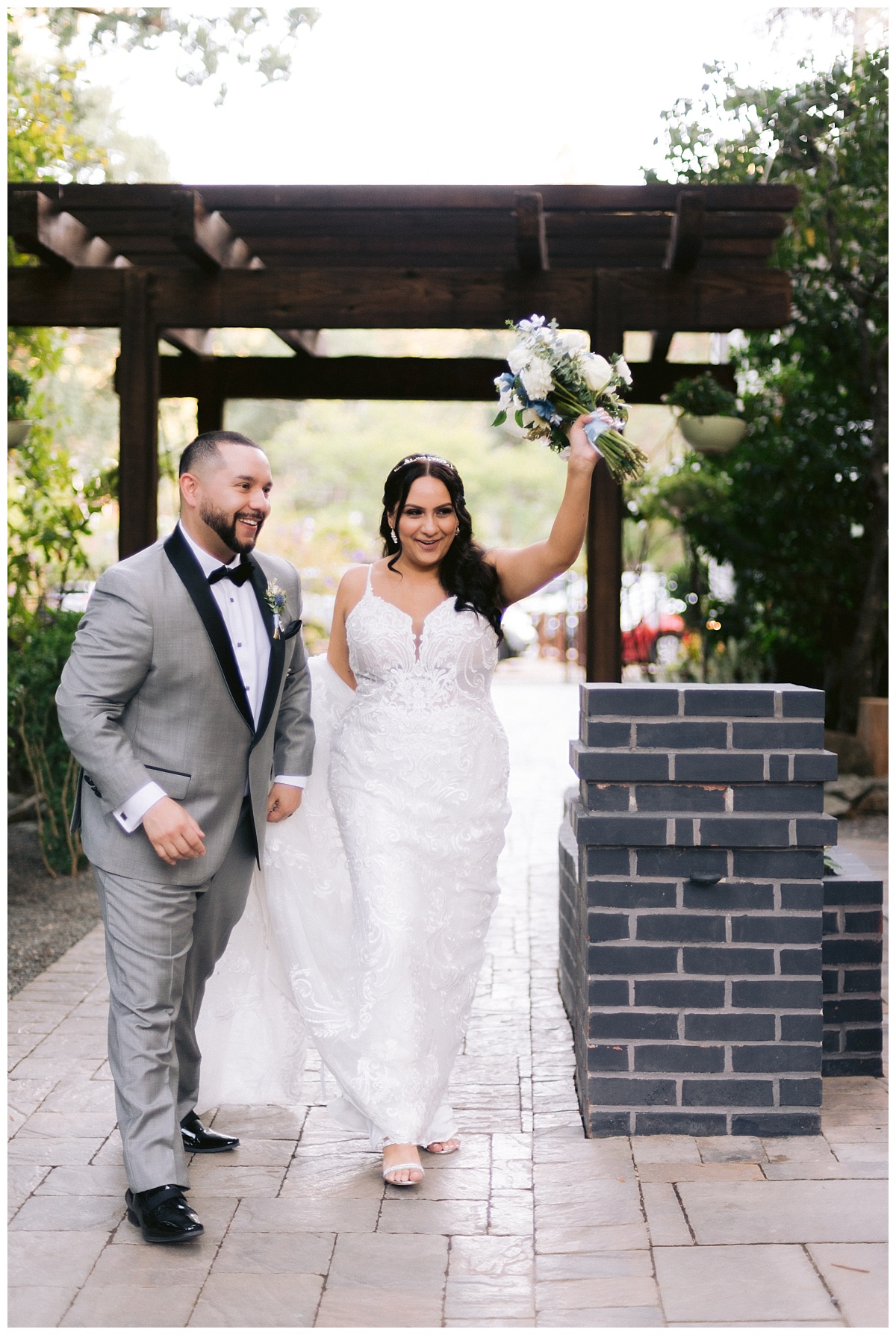 Liliana and Cesar enter their wedding reception