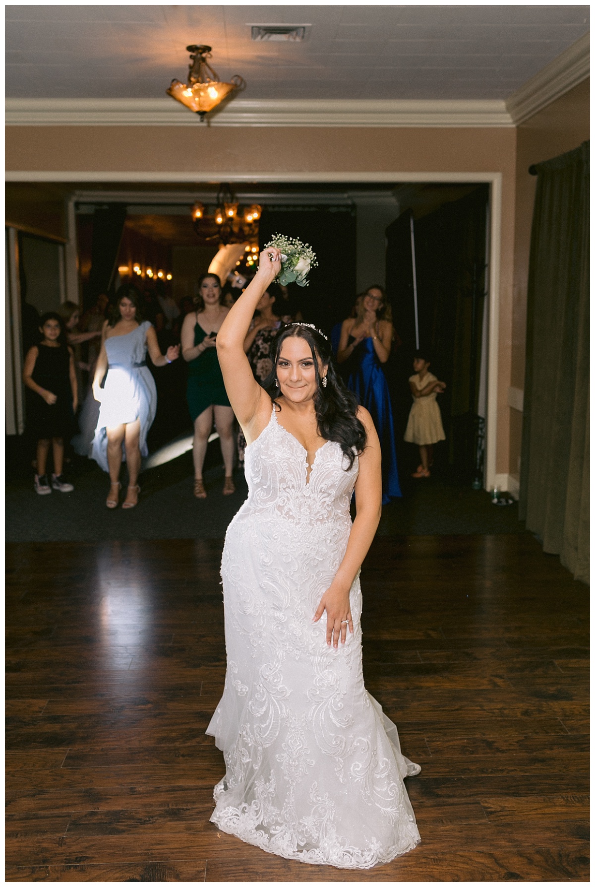 Liliana gets ready to toss the bouquet
