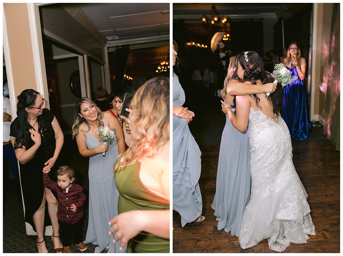 Guest catches the bridal bouquet, bride hugs guest