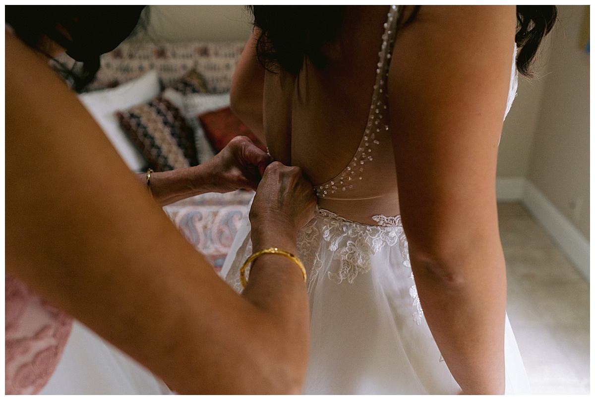 Brianna getting her wedding dress on