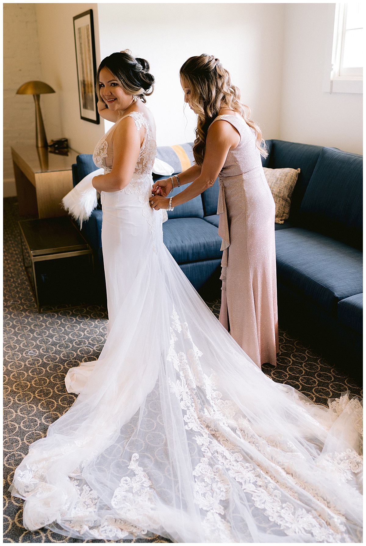 Keyla getting her wedding dress on before the Golden Gate Club Wedding 