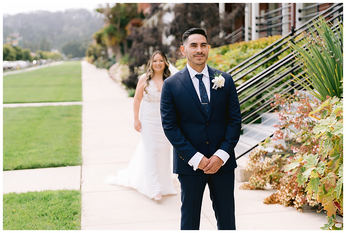 Keyla approaching Renato for their first look before their Golden Gate Club Wedding 