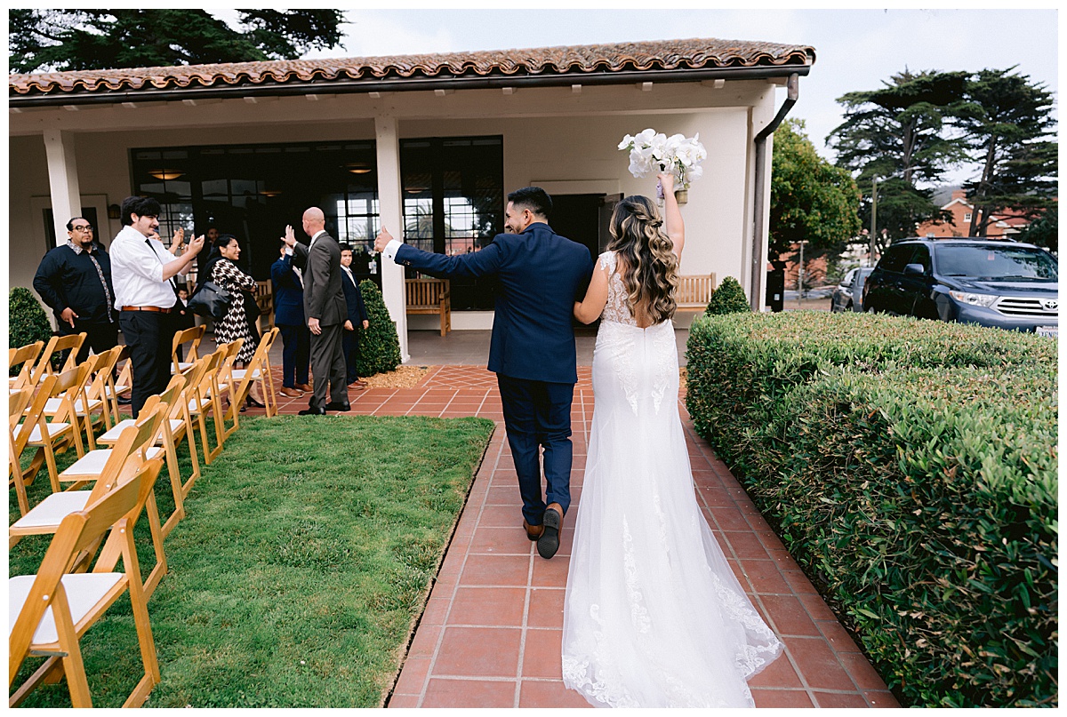 Keyla and Renato leaving their wedding ceremony