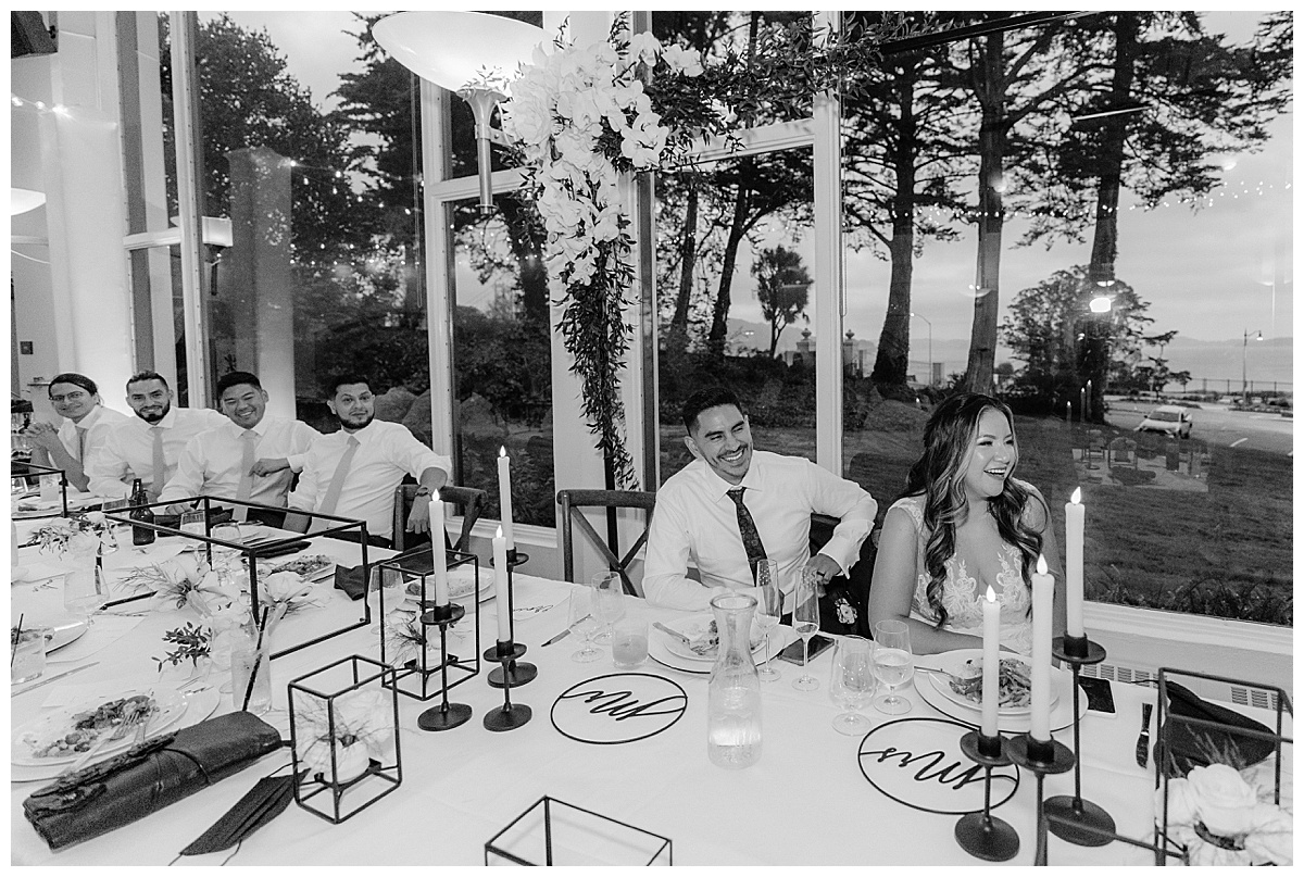 Black and white photo of Keyla, Renato, and groomsmen