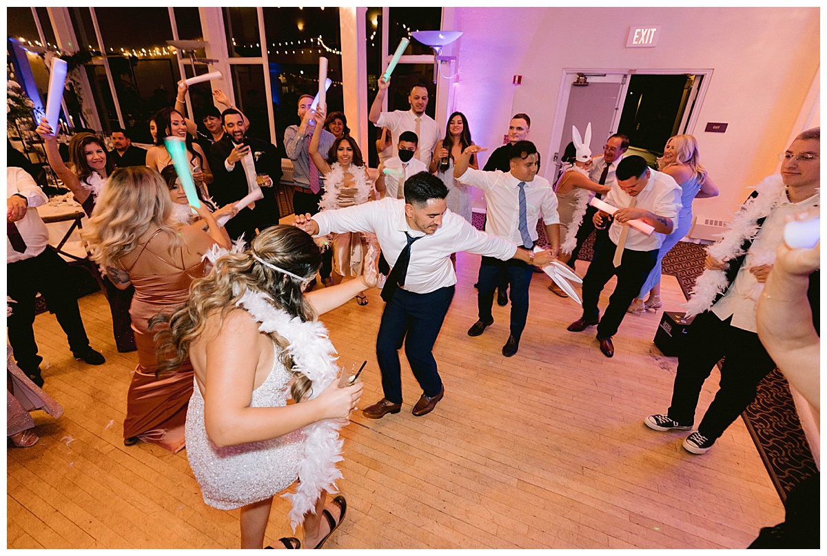 Keyla and Renato dancing with guests