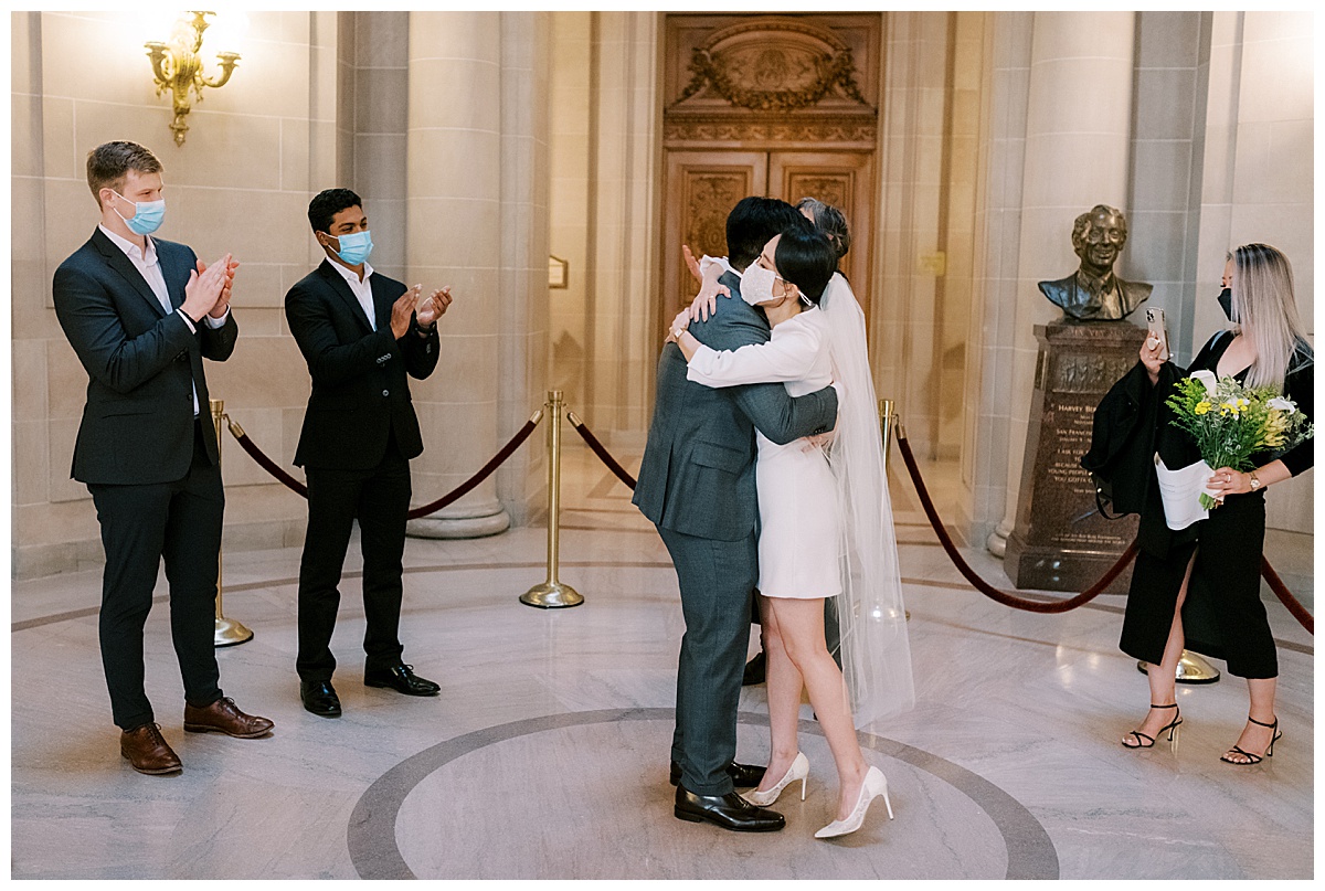 Danielle & Ron's cool and stylish SF City Hall wedding ceremony