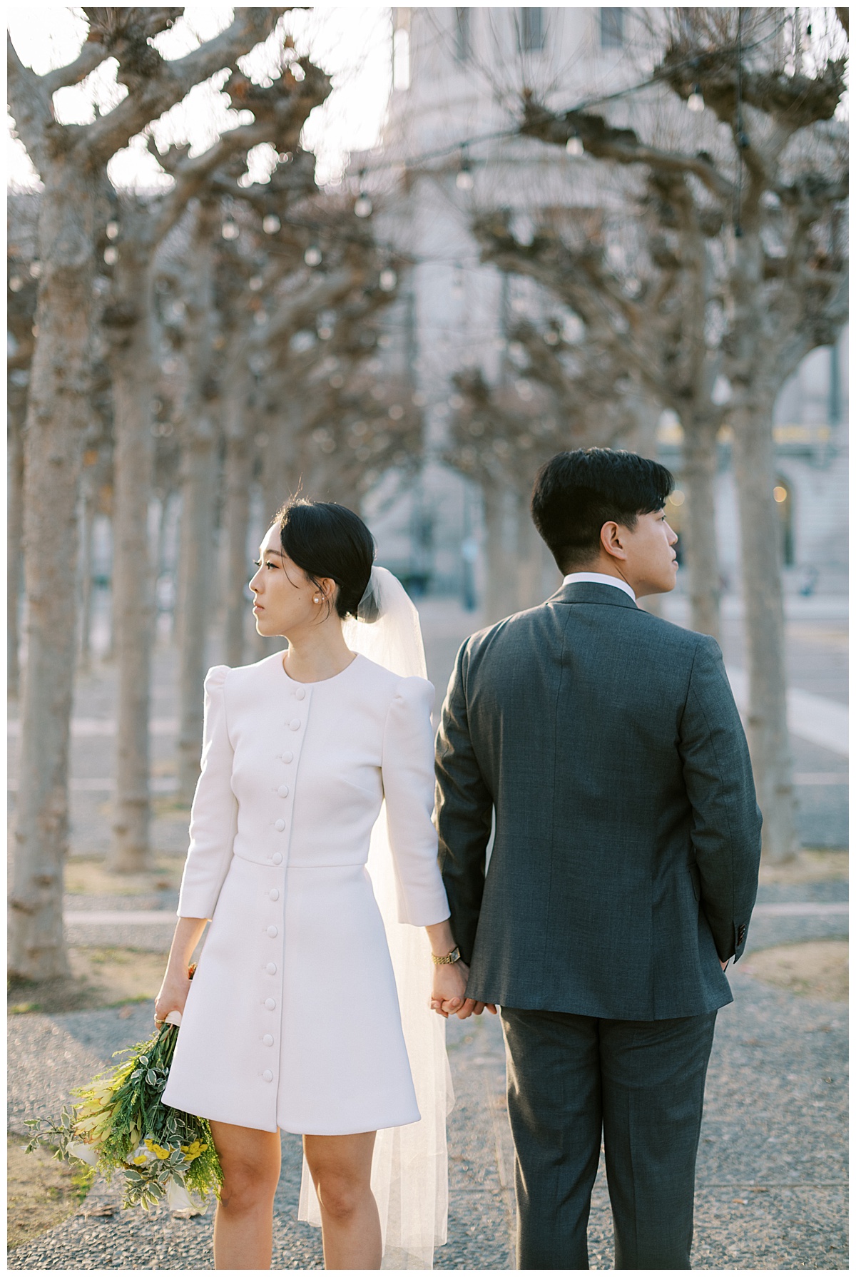 Danielle & Ron's cool and stylish SF City Hall wedding couple's portraits