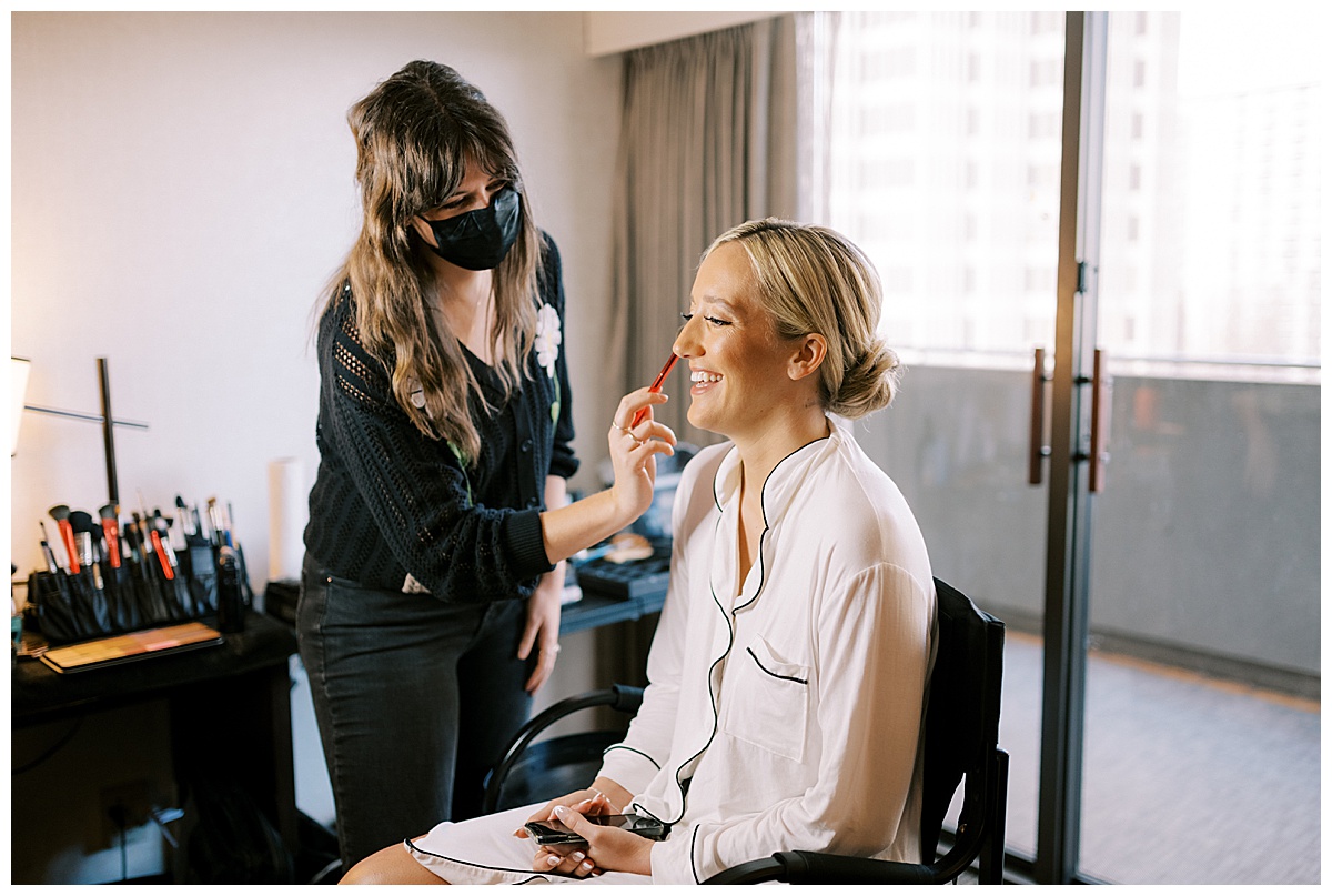 Susie getting her make up done for the Golden Gate club wedding.