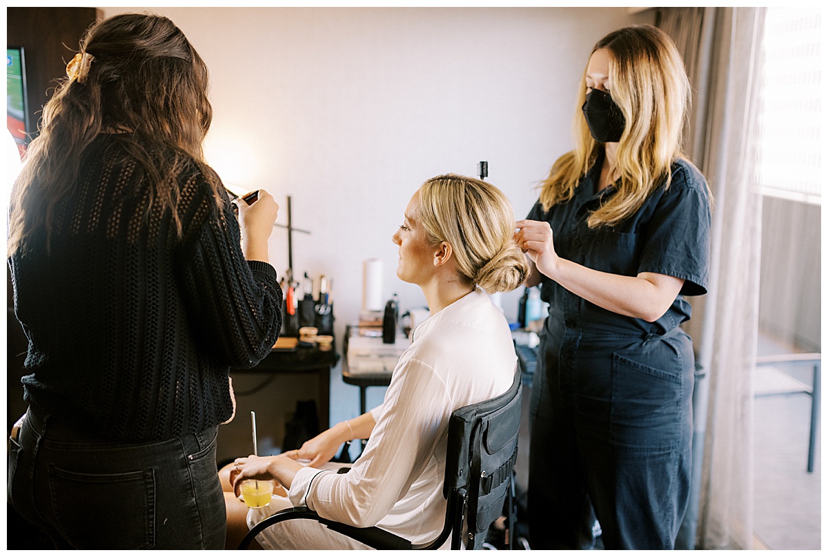 Susie getting her hair done for the Golden Gate Club wedding