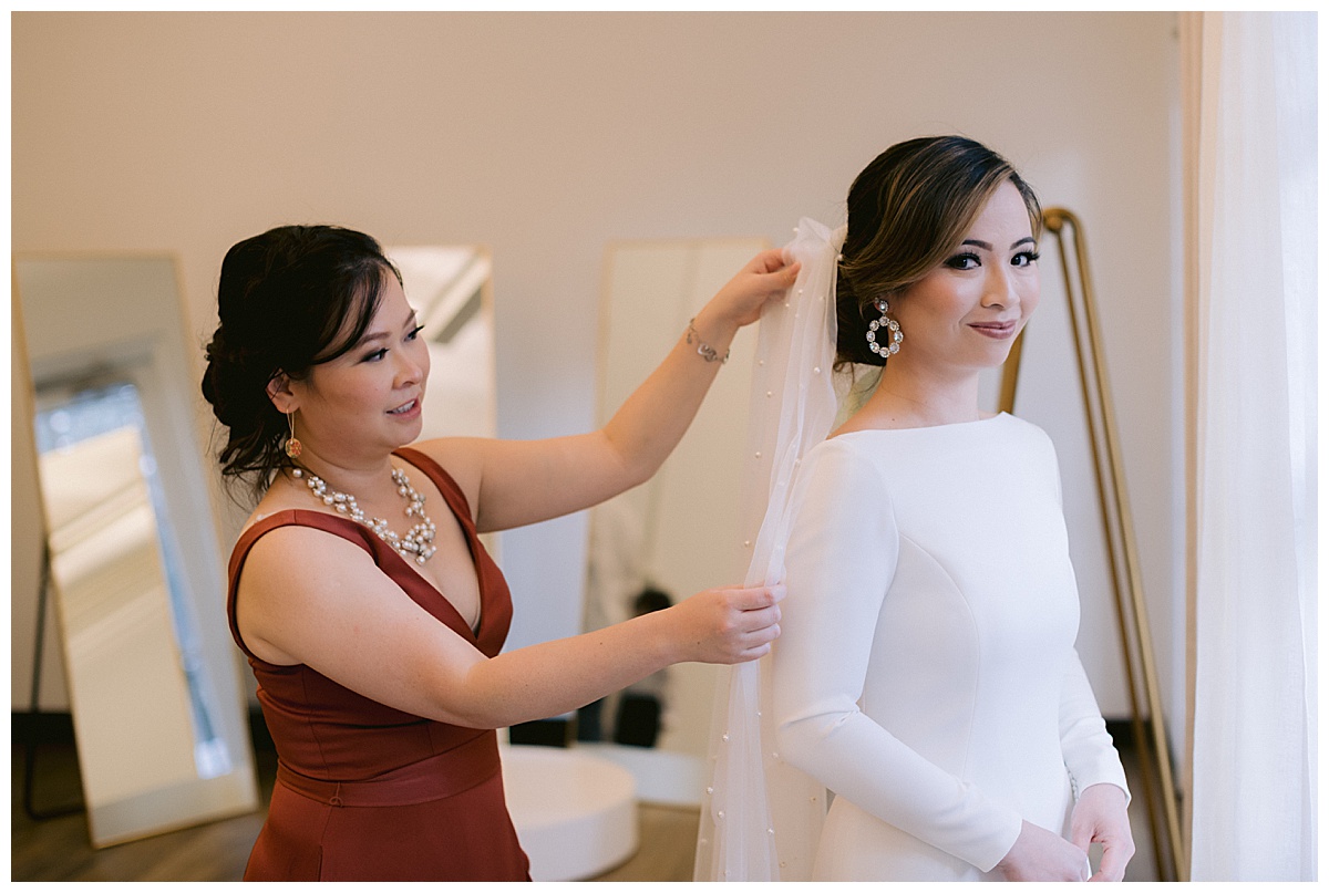 Vivian getting her final touches before the outdoor Presidio Chapel wedding