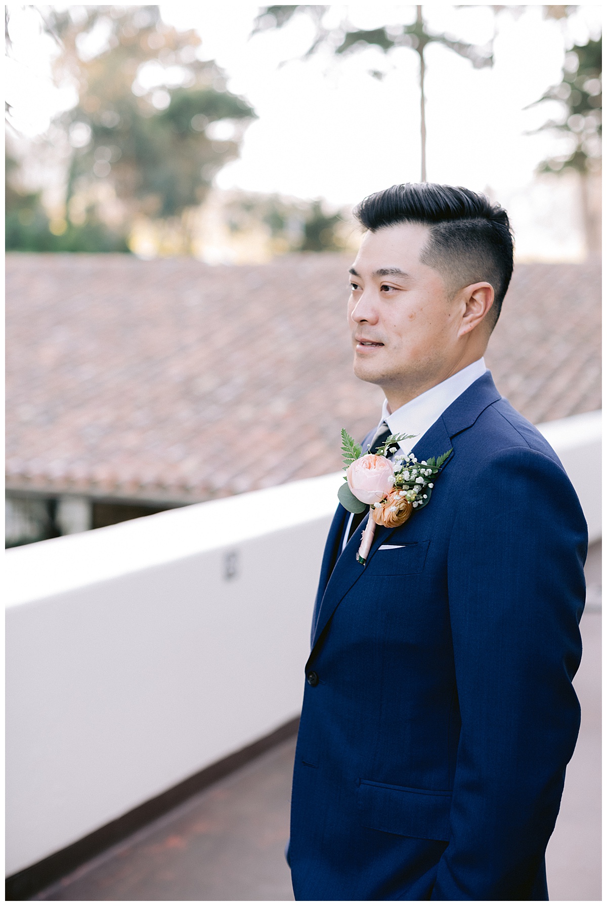 Portrait of Edward before the outdoor Presidio Chapel wedding