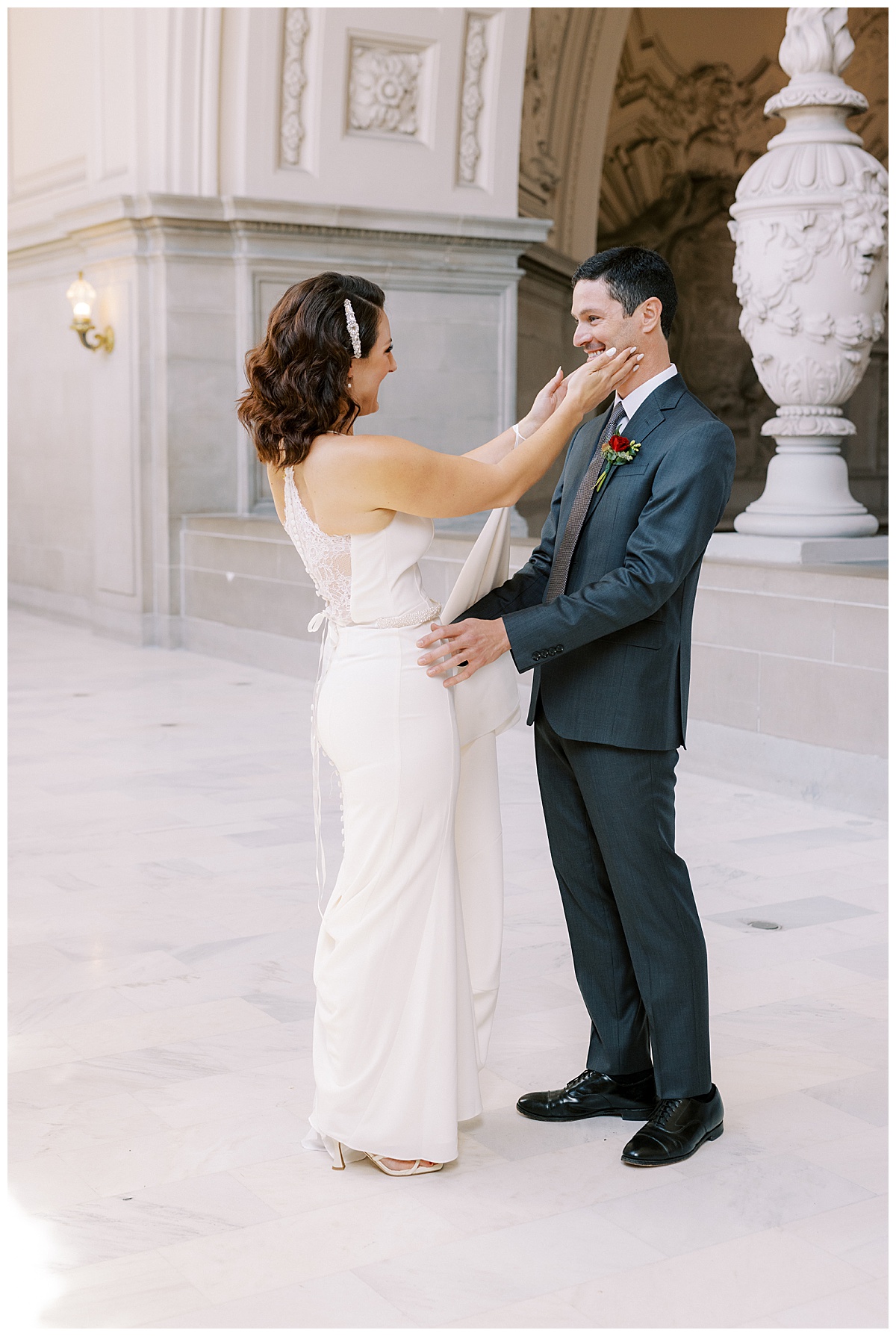 Hillary and Nick's first look before their vintage glam SF City Hall wedding