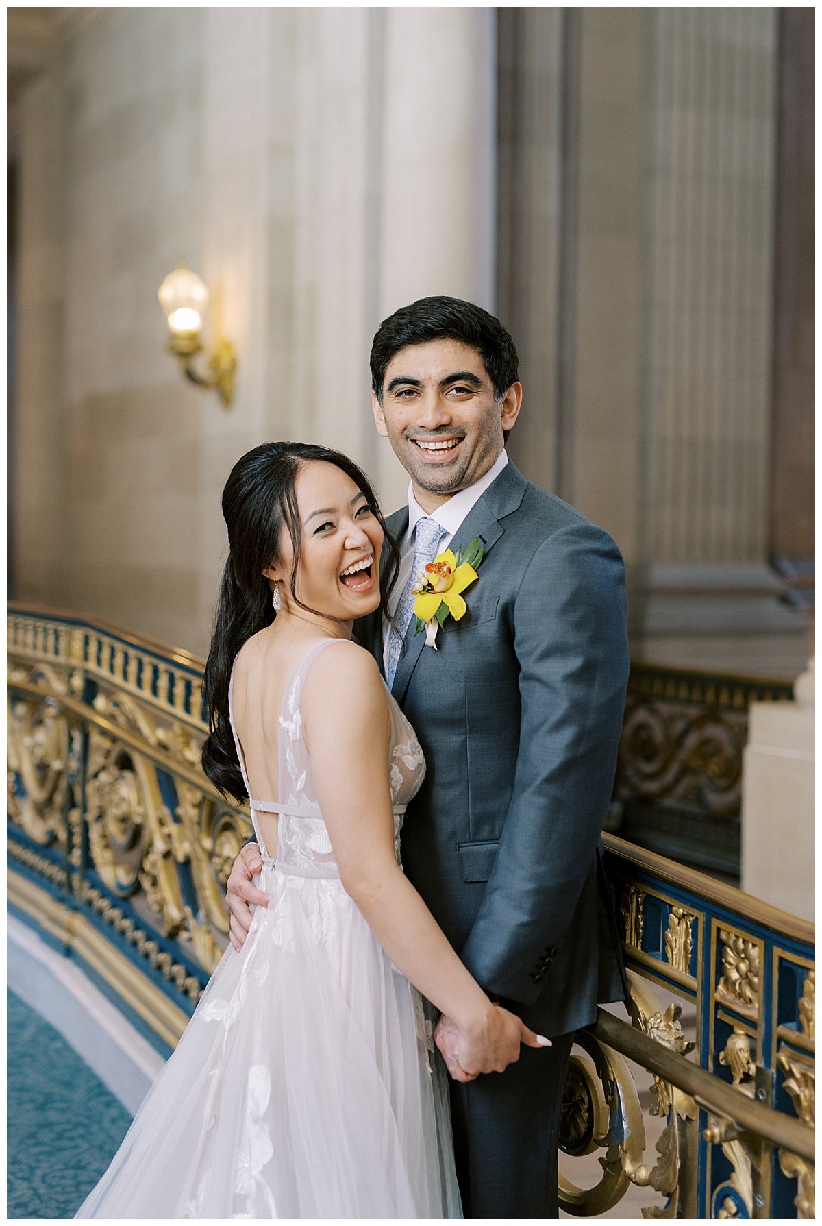 Mary and Ashir laughing after their elopement ceremony