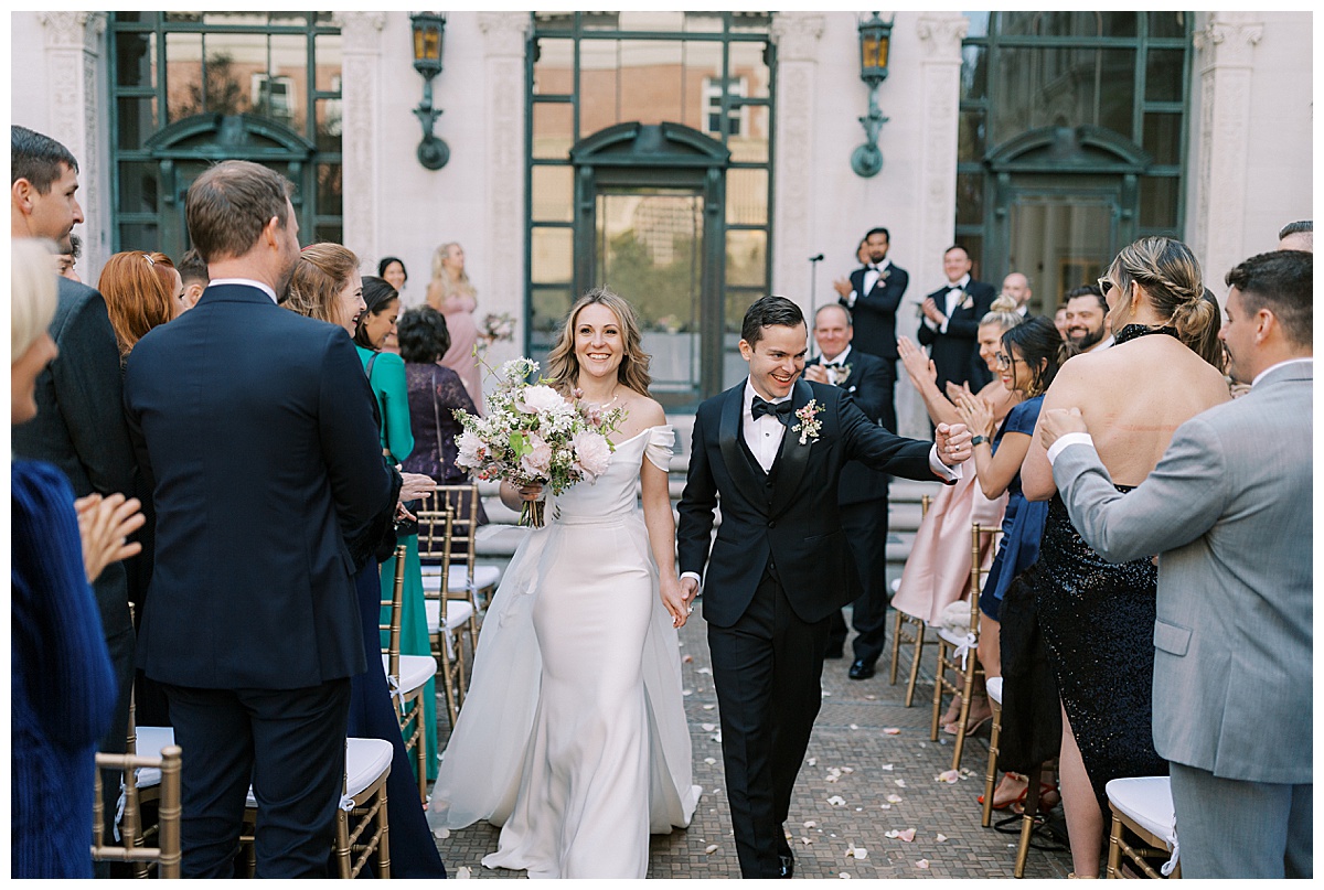 Married couple recessional at Flood Mansion 