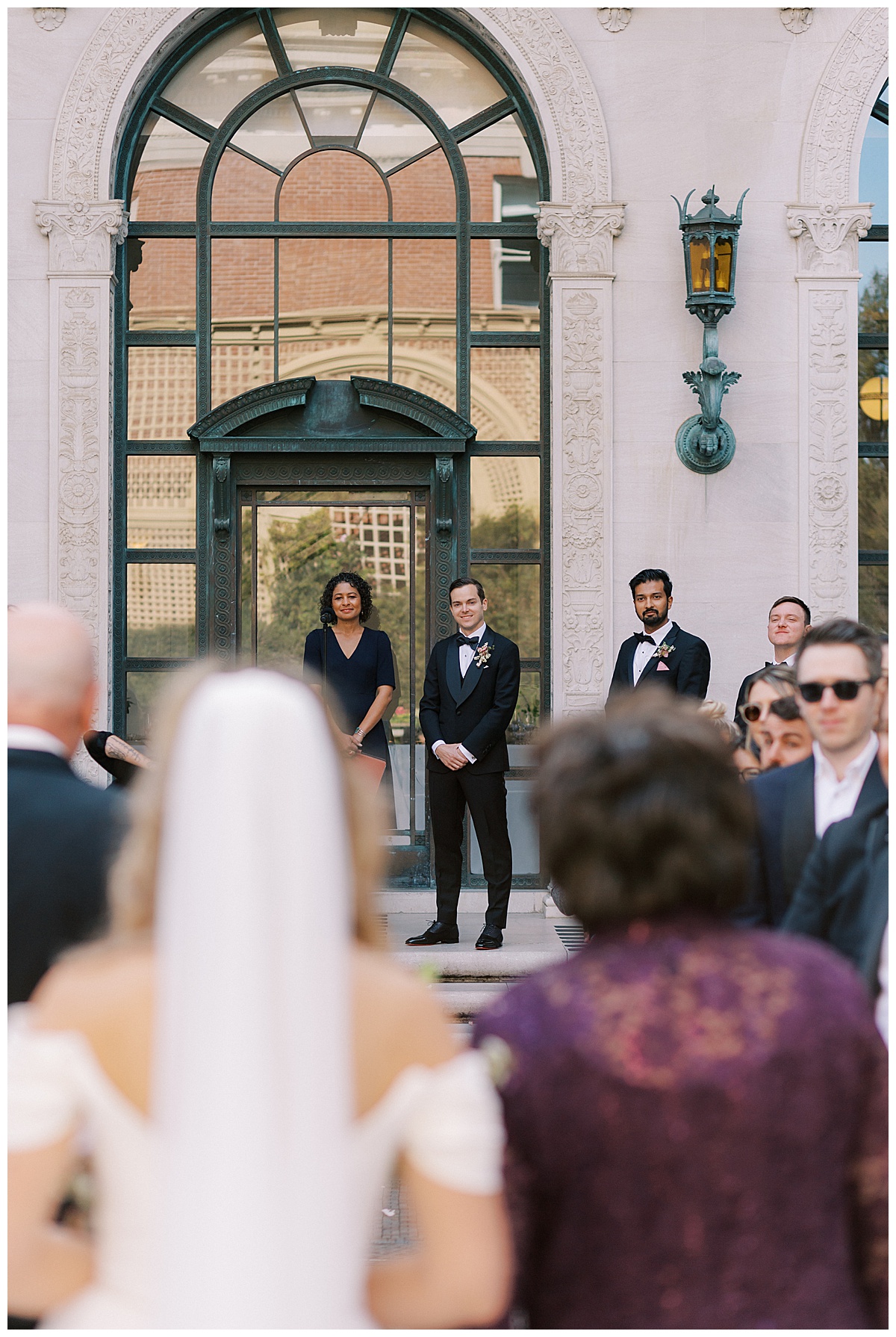 groom seeing bride for the first time at flood mansion