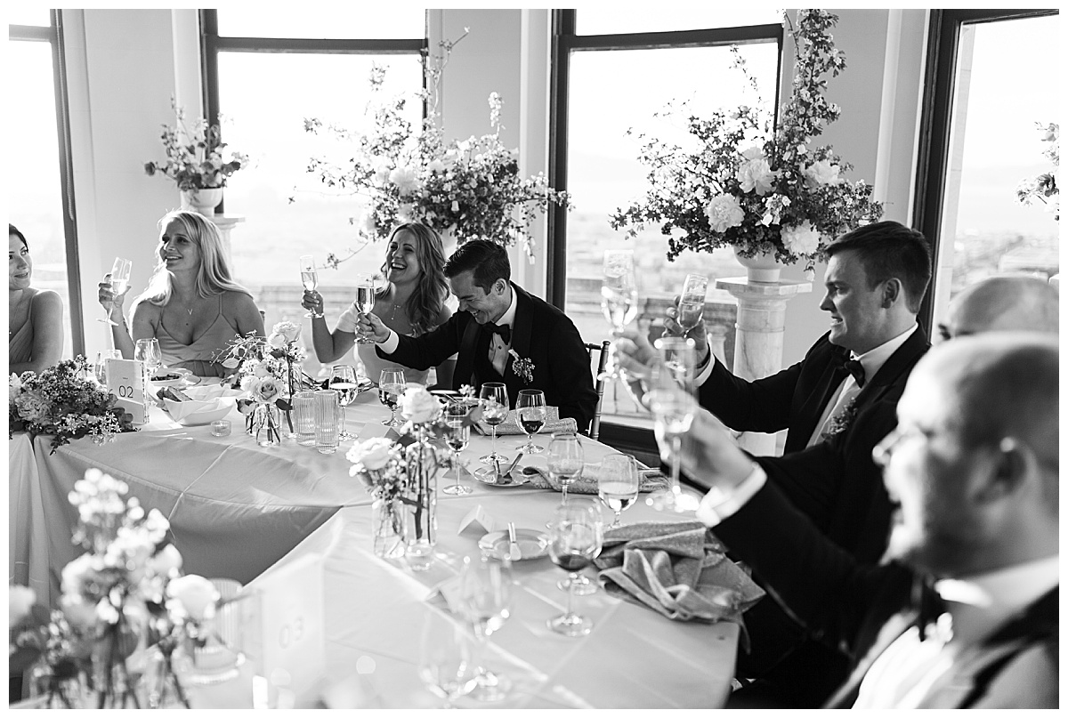 wedding party toasts at flood mansion