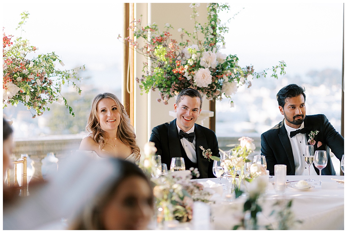 newlyweds at reception at flood mansion