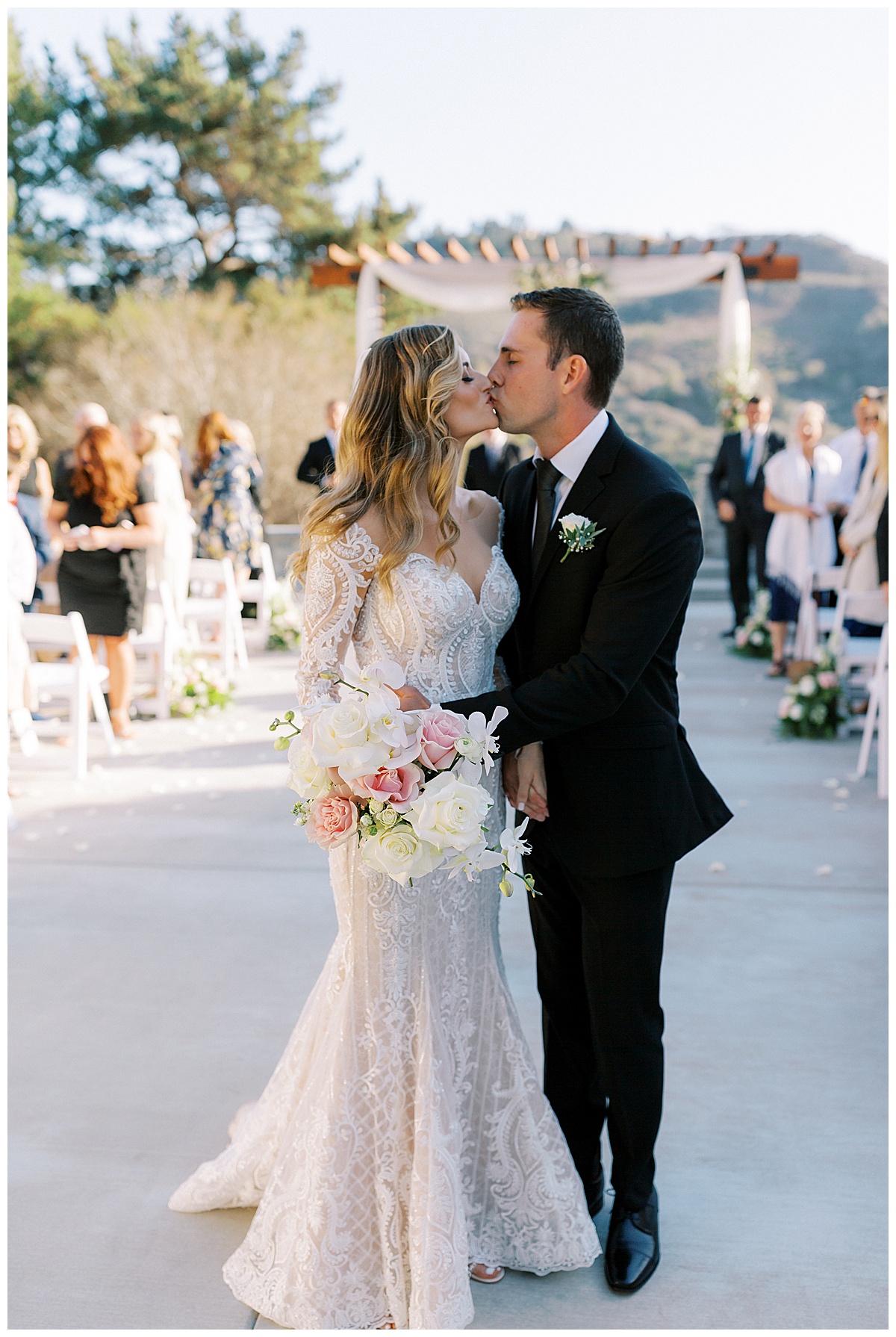 monterey-wedding-photography-couples-aisle-kiss.jpg