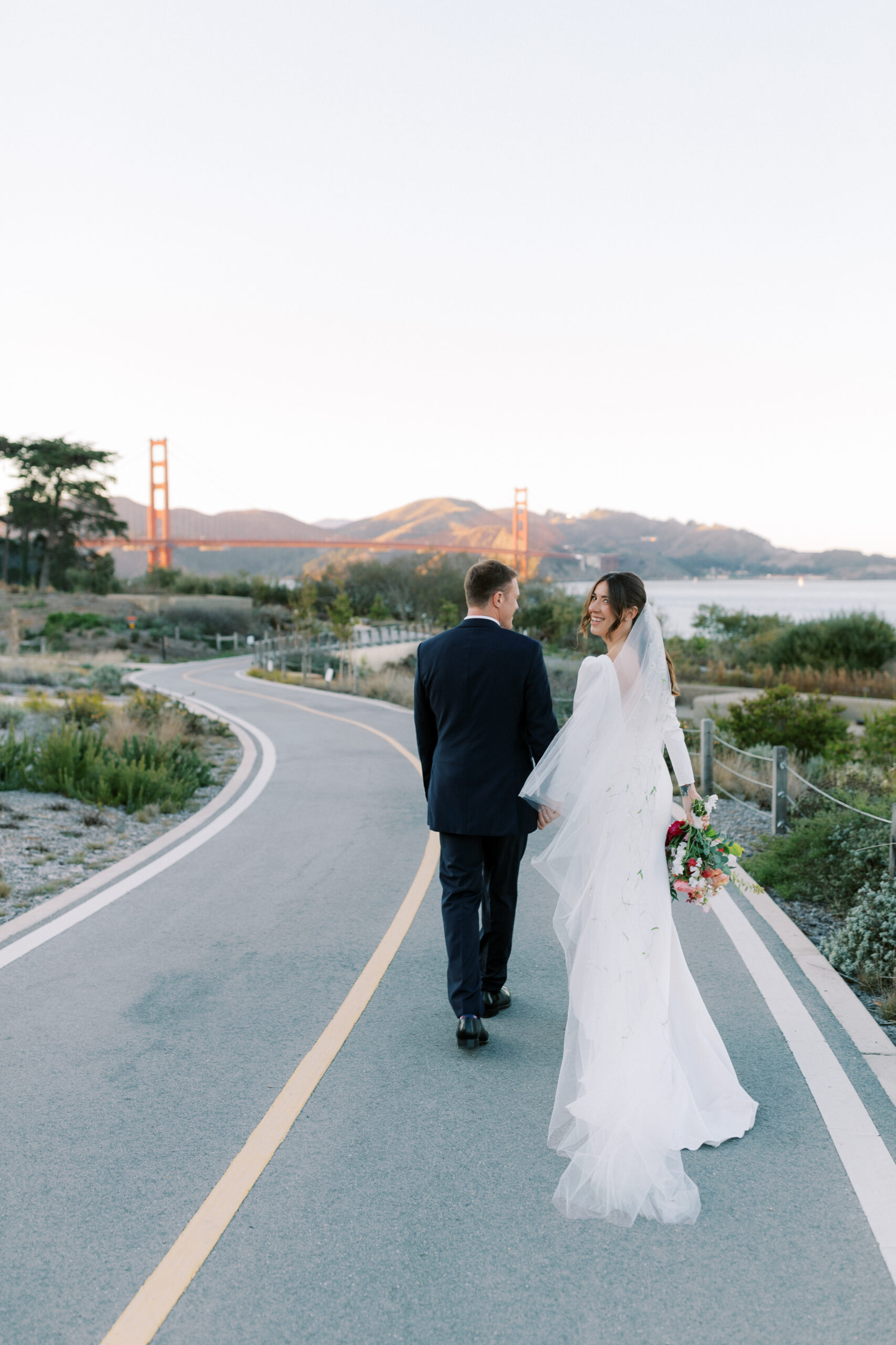 Couples portrait at sunset at golden gate club at the presidio