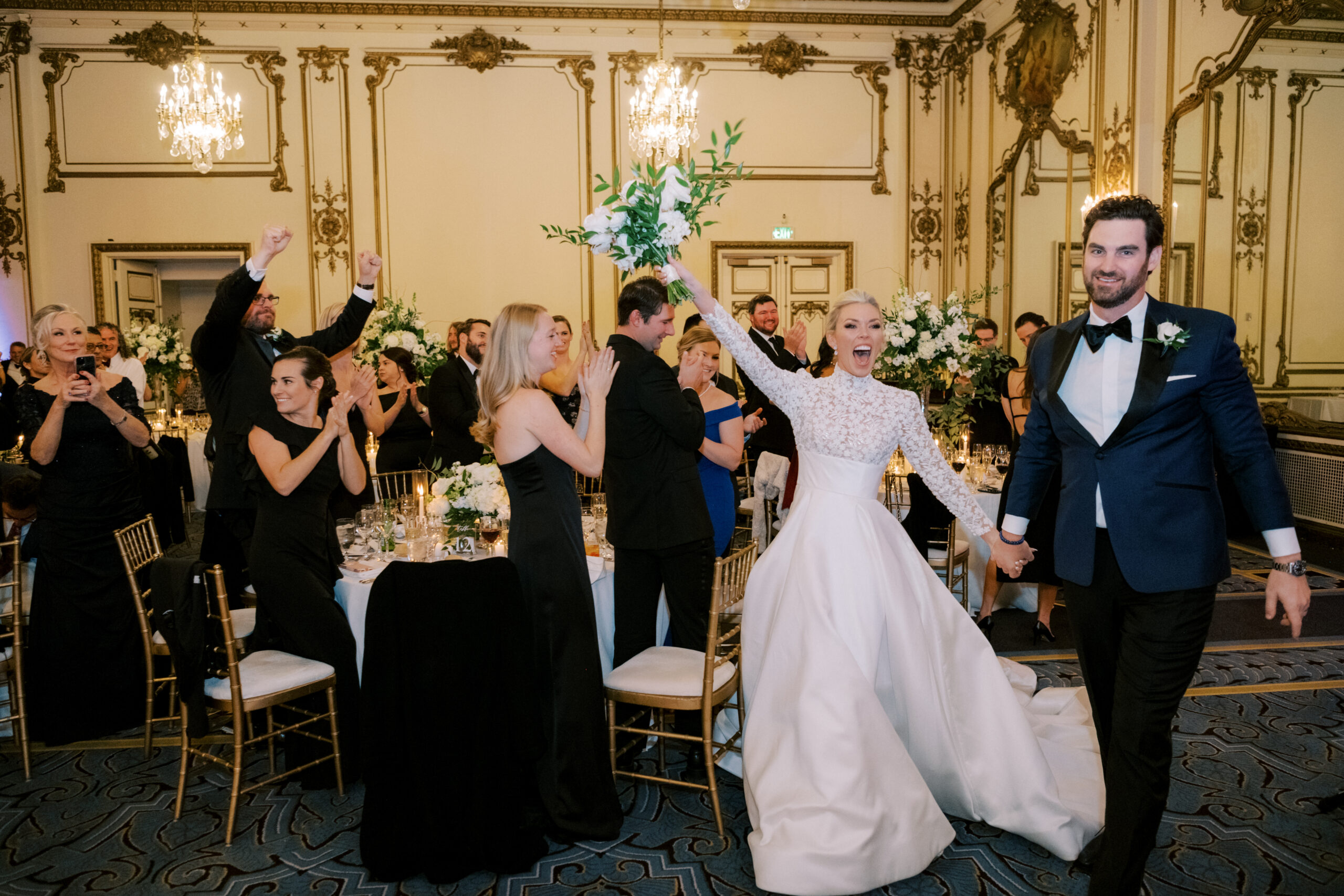 newlywed couple entering their reception at Fairmont San Francisco