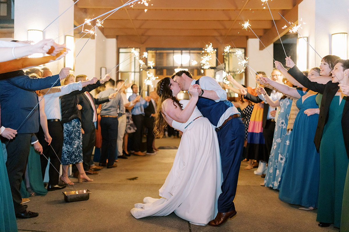 newlywed couple sparkler exit at presidio golf course wedding