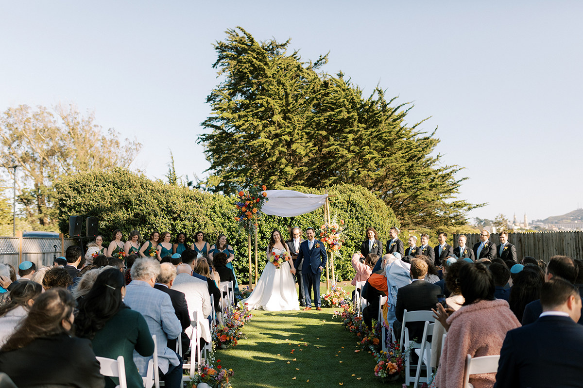 wide shot of couples at the alter at presidio golf course wedding