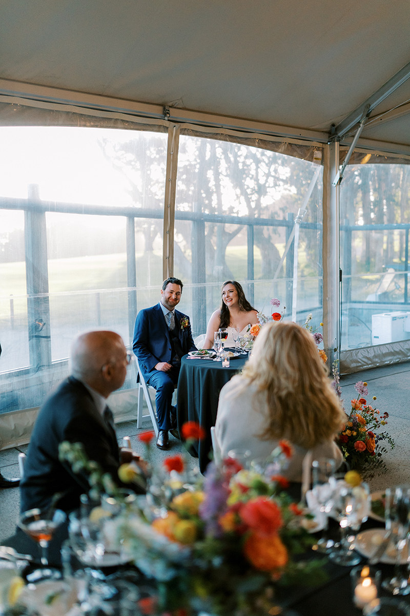 married couple at reception at presidio golf course wedding