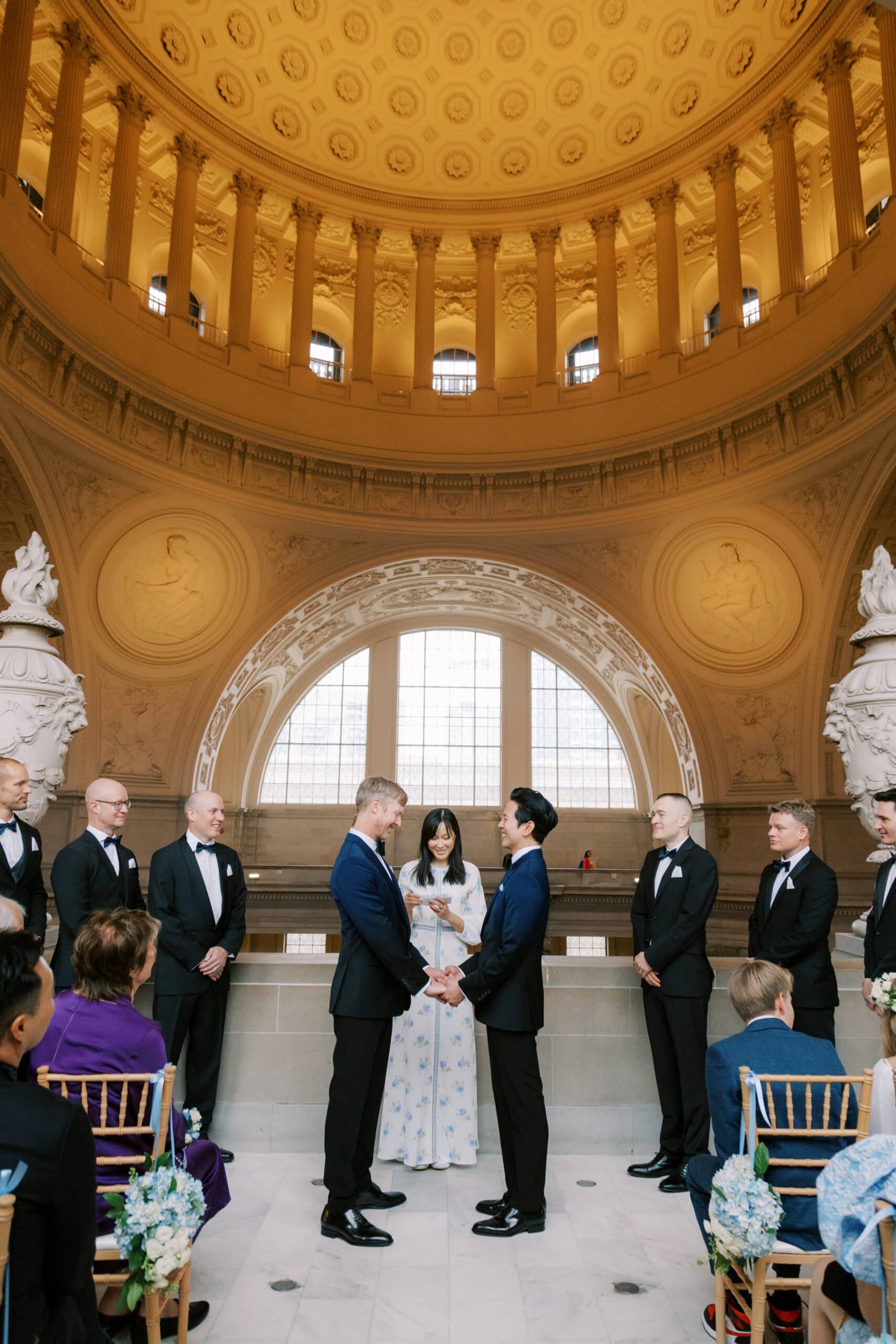 gay couple getting married at San Francisco city hall on the fourth floor