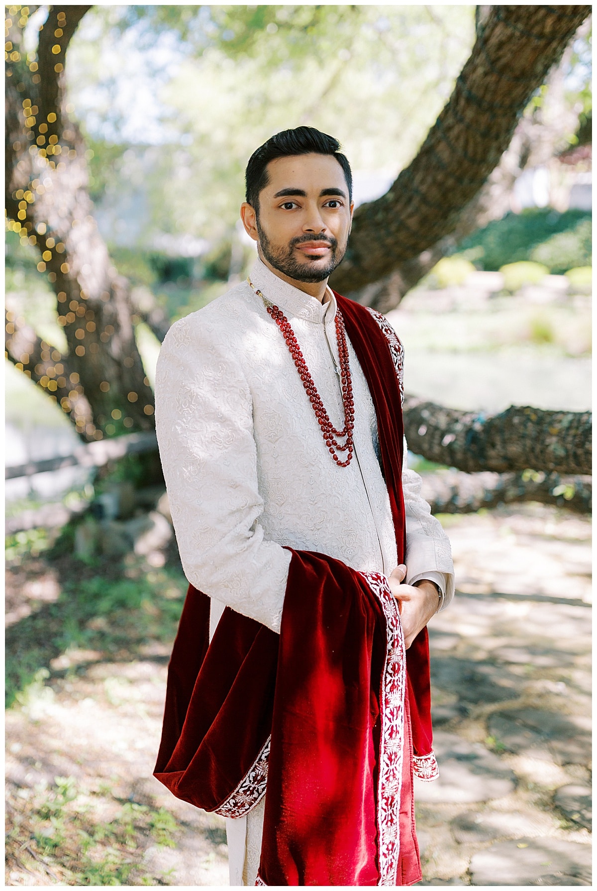 groom standing outside at Nella Terra on wedding day