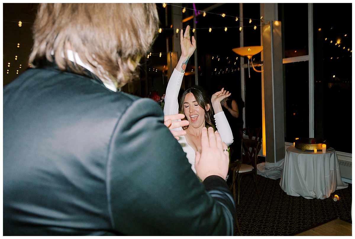 Bride dancing at wedding reception at Golden Gate Club in San Francisco