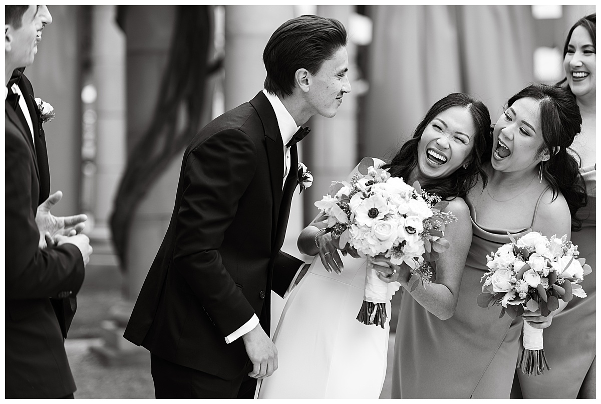 wedding party playful at club at ruby hill