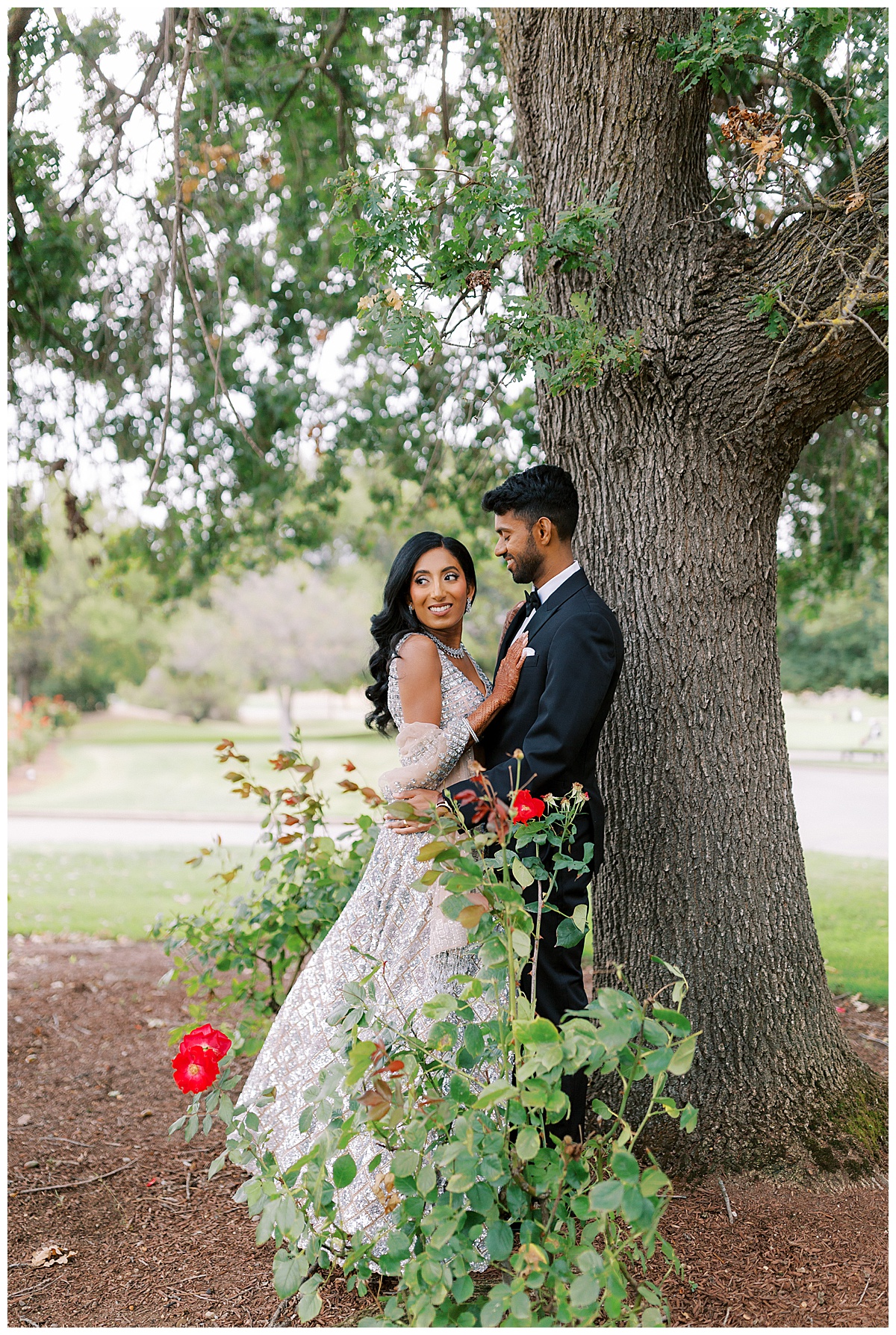 Portrait of couple in a rose garden at the club at ruby hill in pleasanton California. 