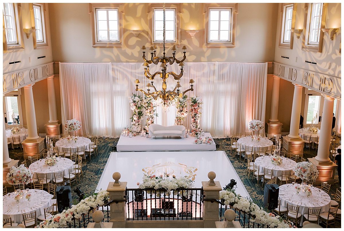 wide photo of the club at ruby hill reception space with ambient lighting