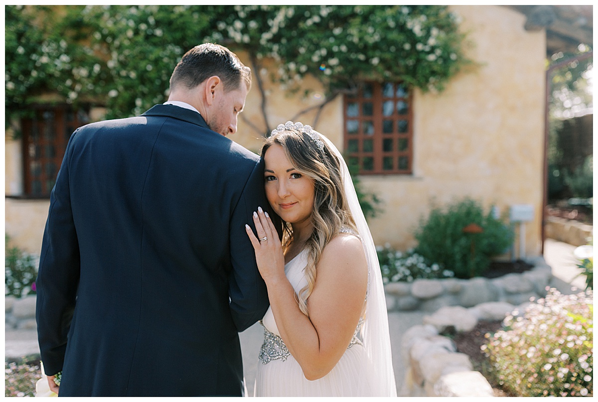 couple outside of carmel mission basilica