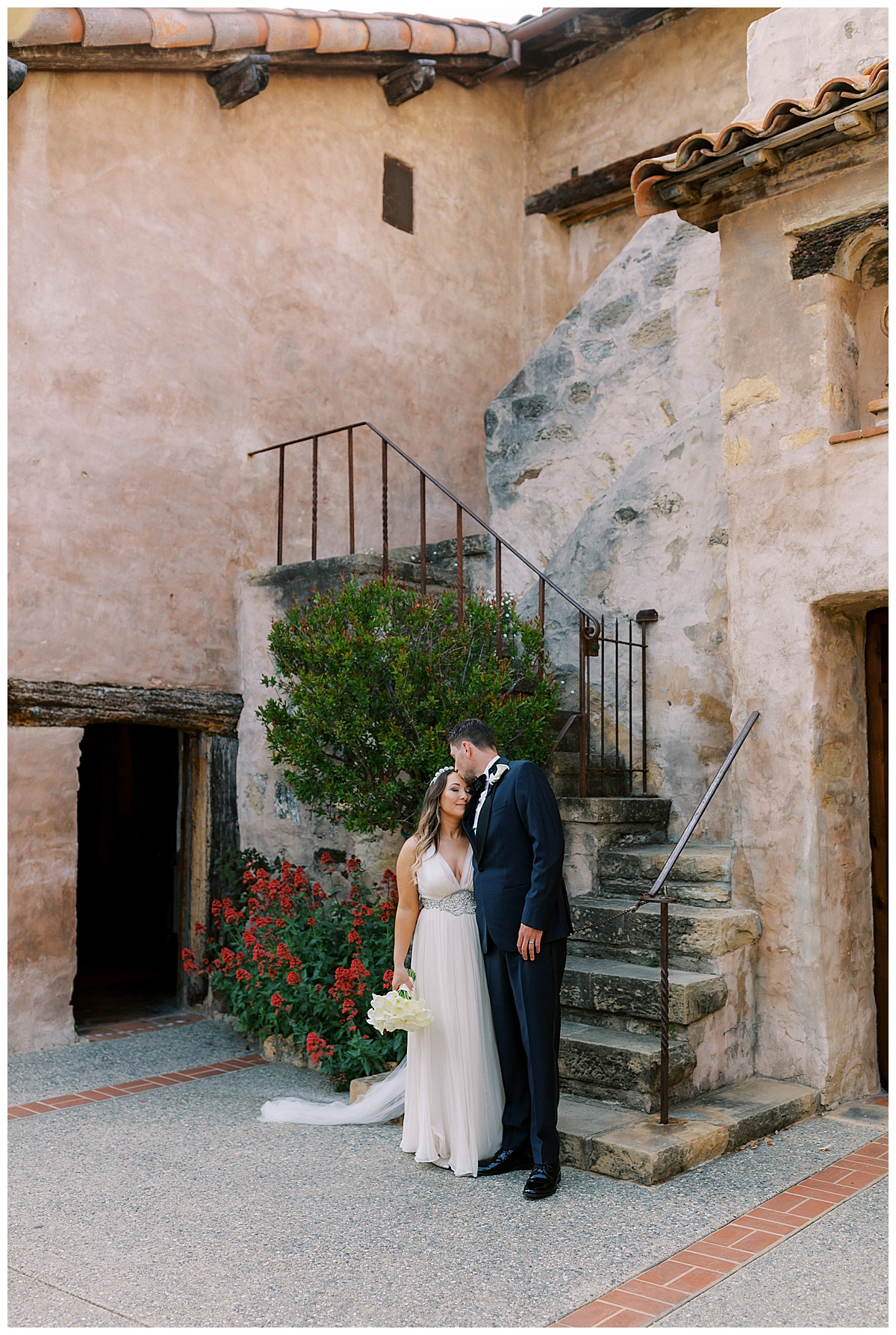couples portrait at carmel mission basilica
