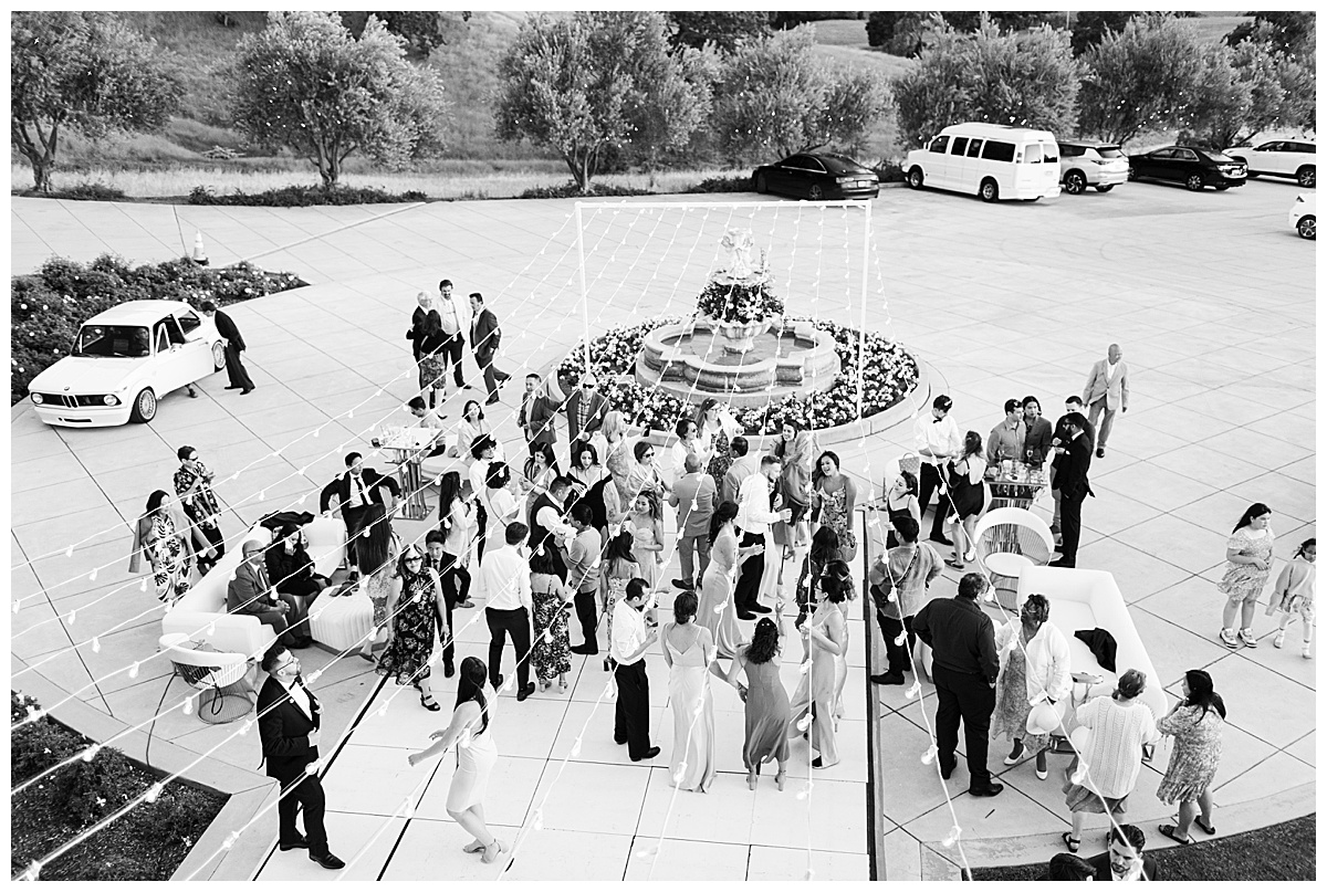 overhead photo of guests on the dance floor outside of willow heights mansion 